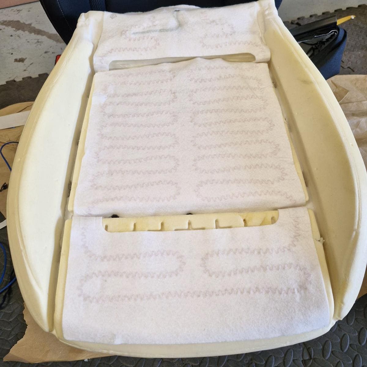 Genuine OEM heated seat element coverage fitted inside a Skoda Karoq seat