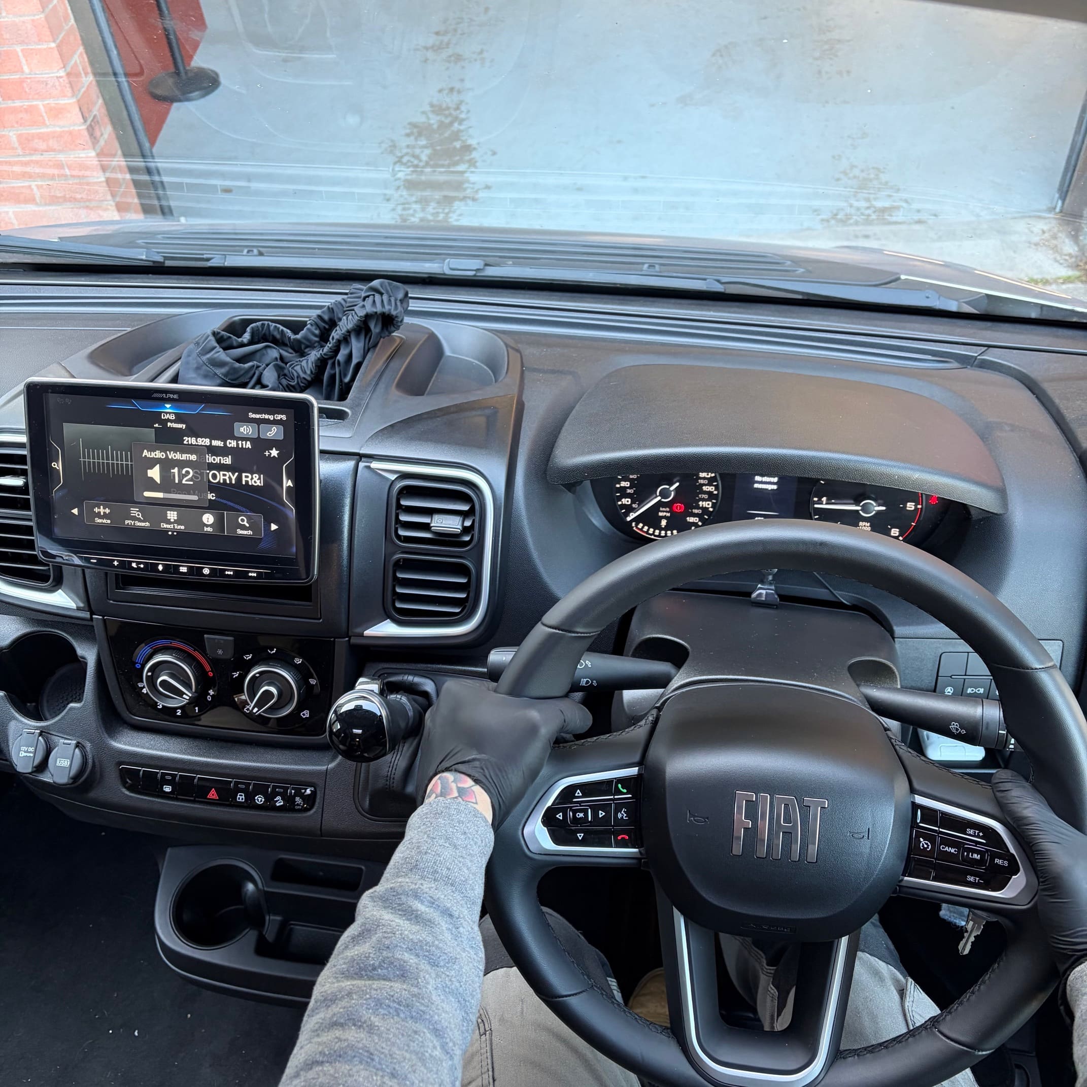 Alpine Halo 9 sat nav head unit test fitted in a Fiat Ducato dash during custom modification work