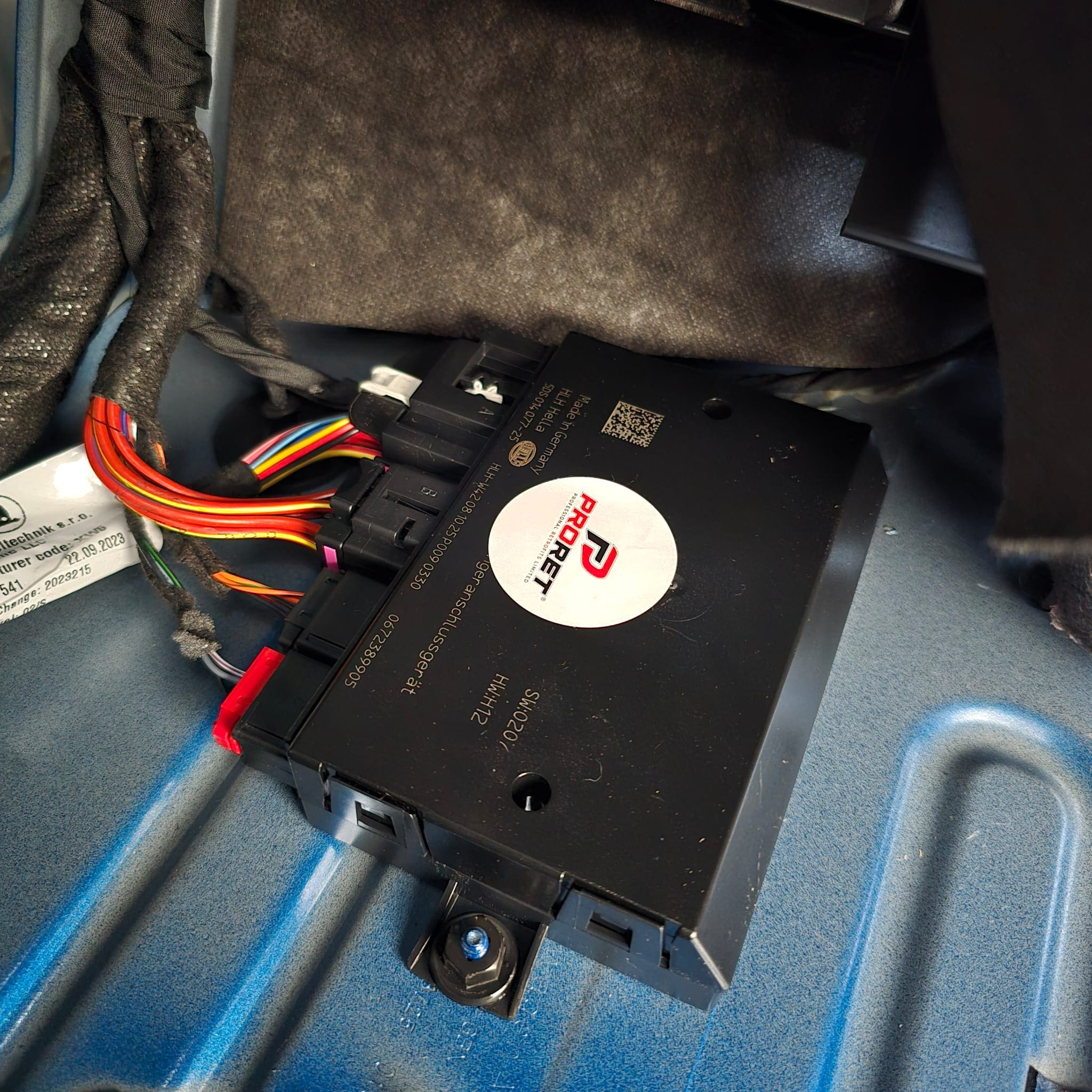 Towbar retrofit work underway on a 2026 Skoda Kodiaq with factory coding process