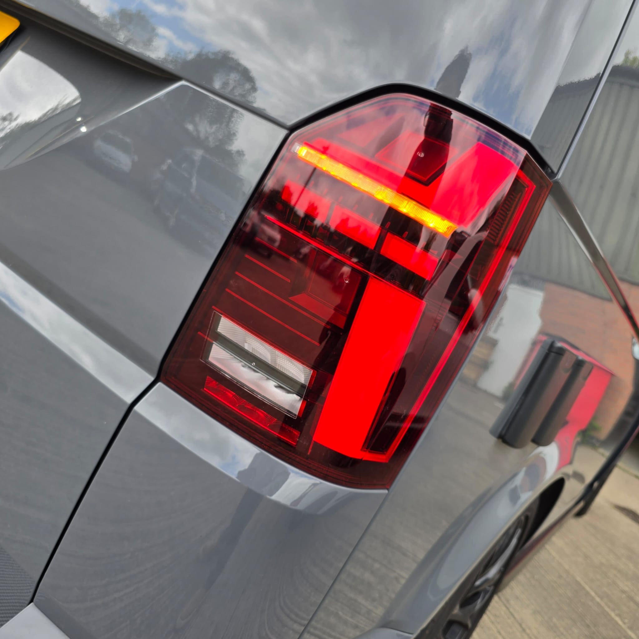 Rear tailgate styling improved with OEM smoked LED tail lights on VW T6.1