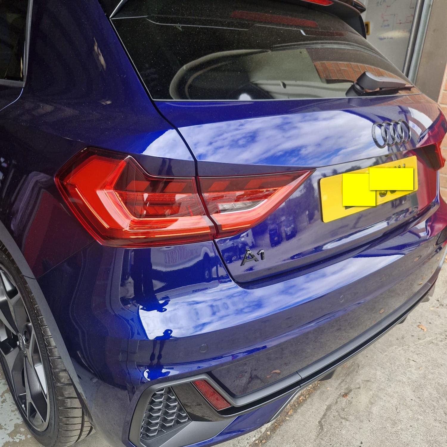 Audi A1 retrofit in progress with OEM reversing camera and coding work