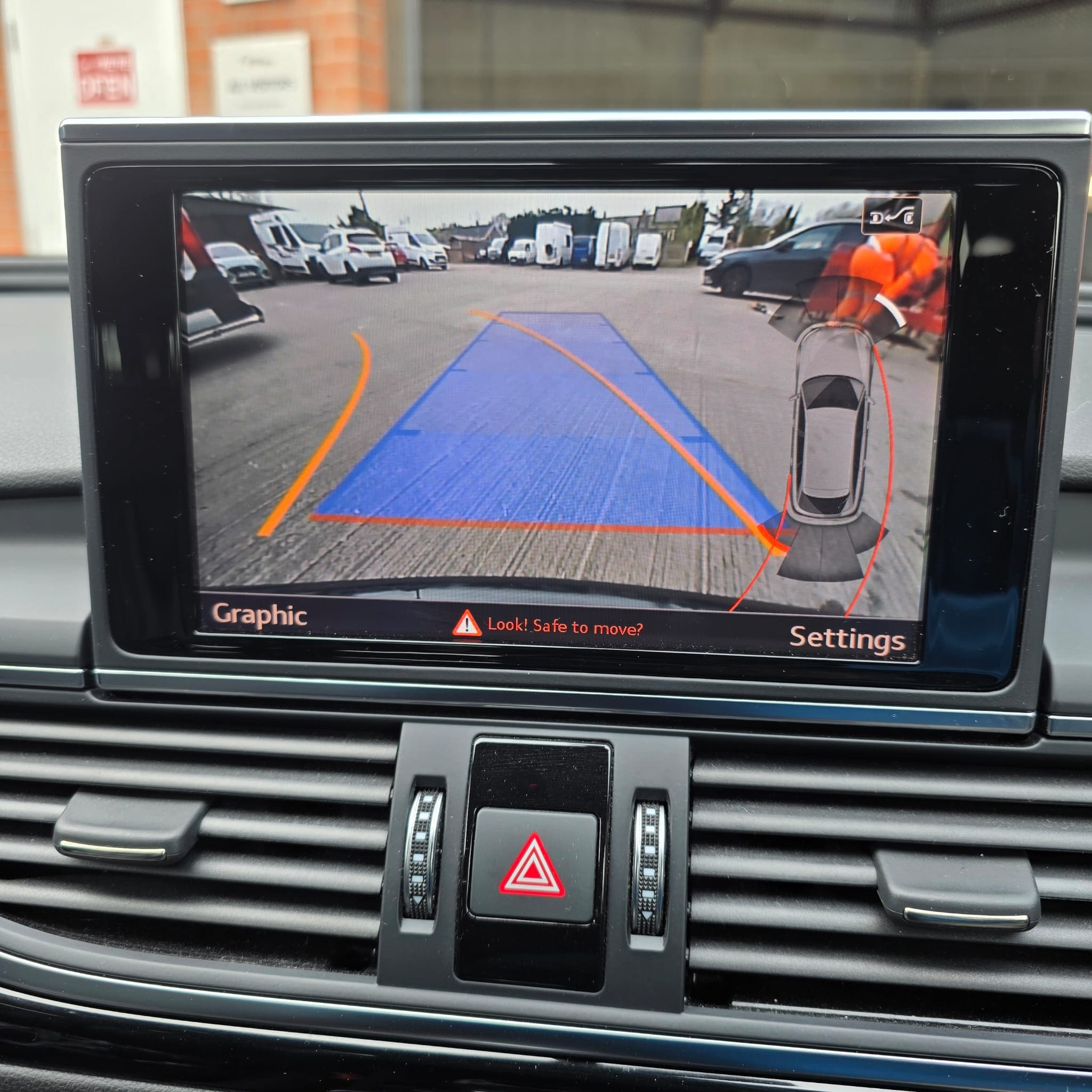 Audi A4 B9 Highline reversing camera retrofit showing calibrated dynamic steering guidelines on screen