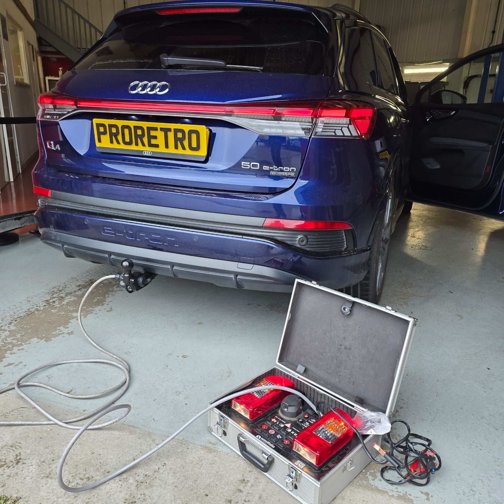 Completed Audi Q4 OEM towbar retrofit ready for handover after ODIS diagnostics and activation