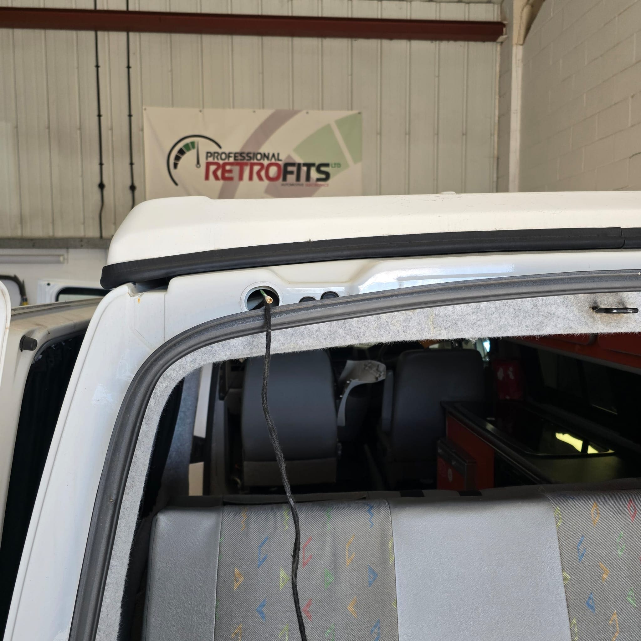 Pop top hinge area checked to ensure the reversing camera wiring has safe slack and support