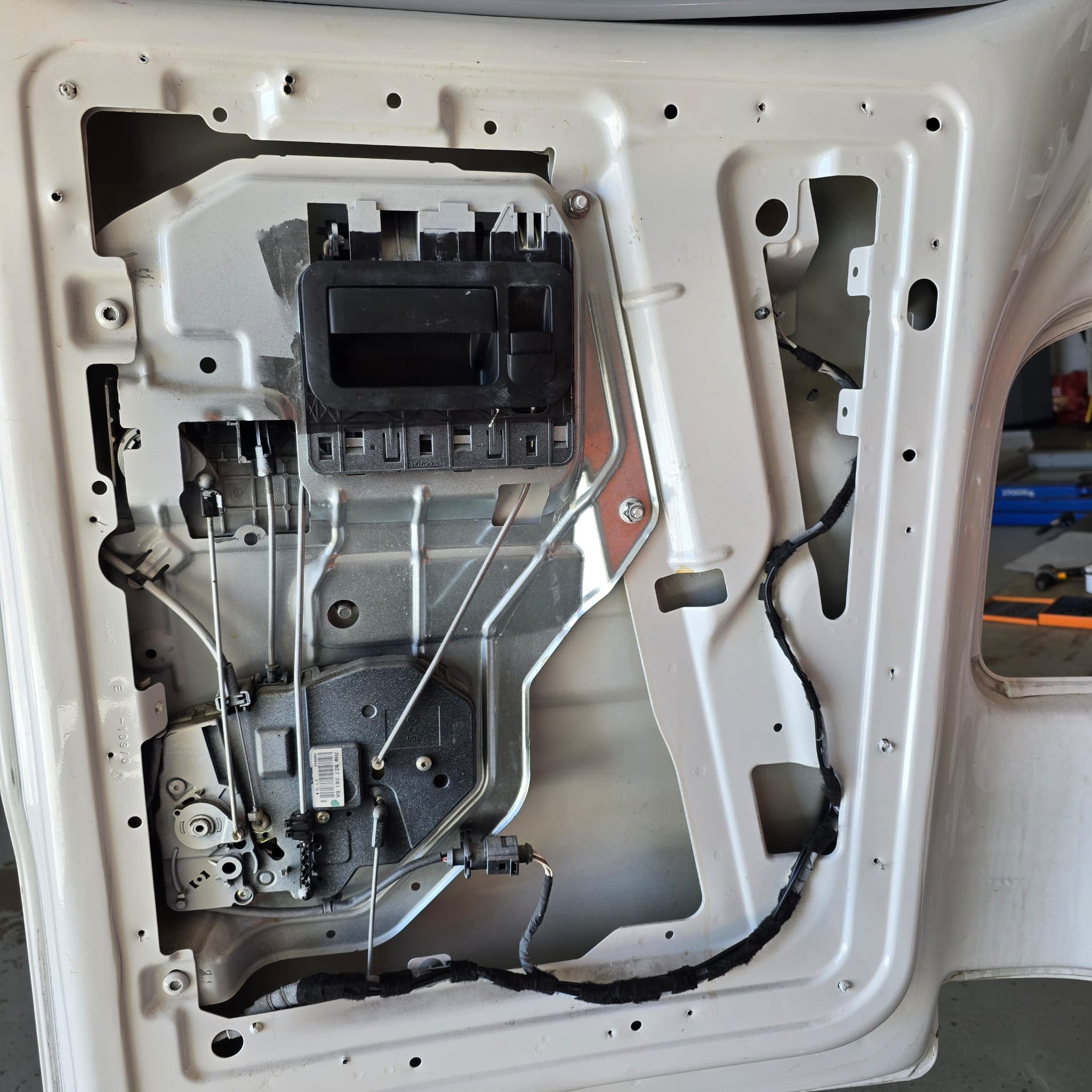 Wiring run secured and protected as part of a pop top rear view camera retrofit