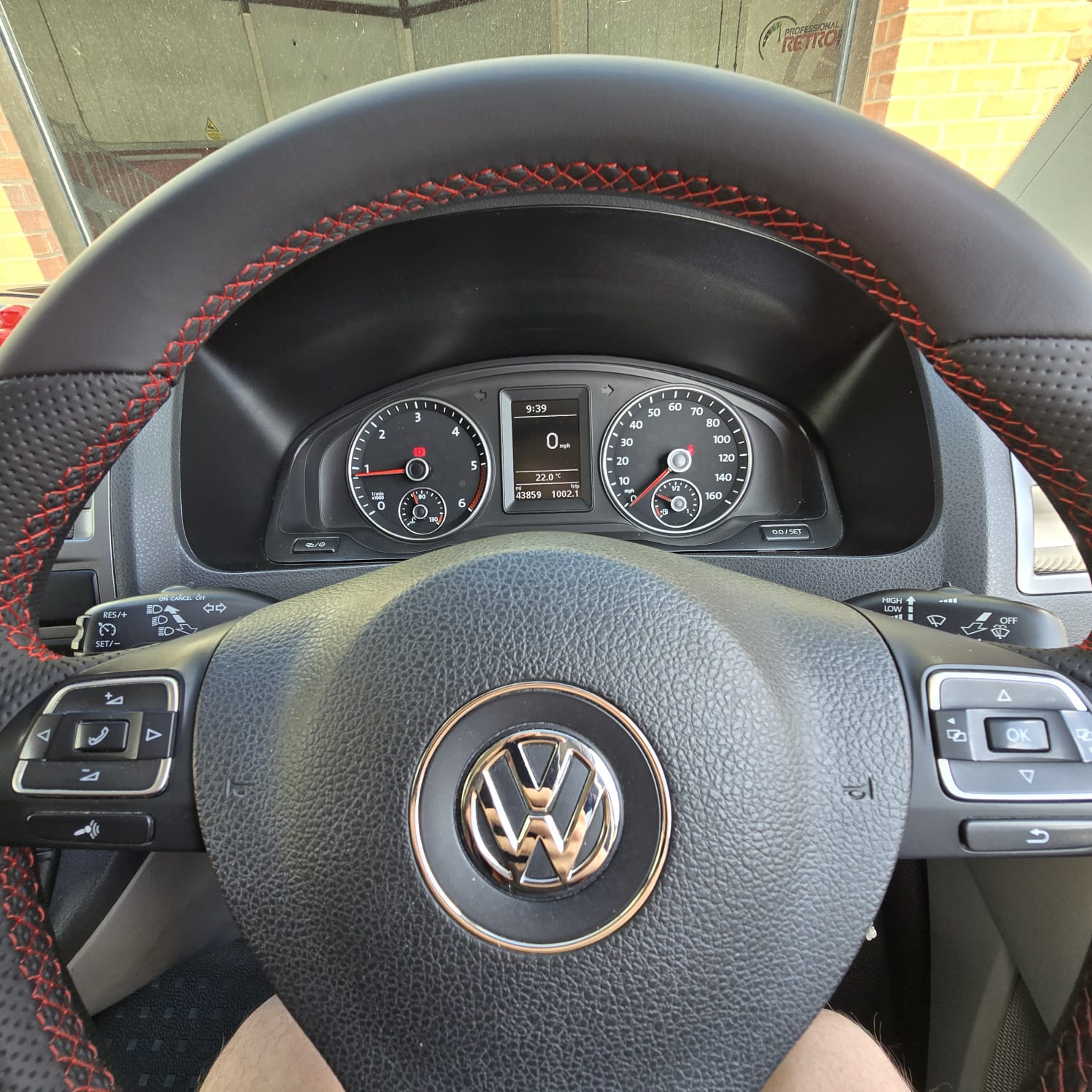 VW T5.1 custom steering wheel with red stitching and Alcantara