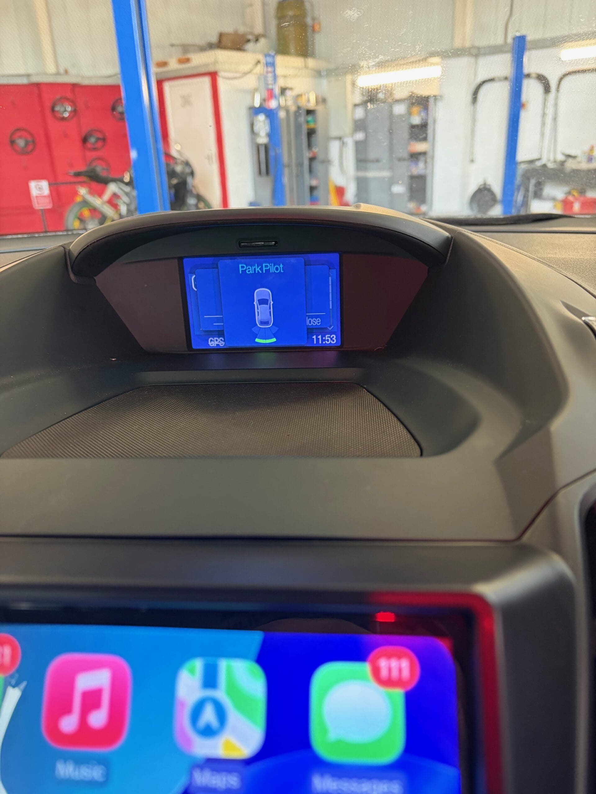 Close-up of Pioneer head unit in a Ford C-Max with CarPlay interface ready for use