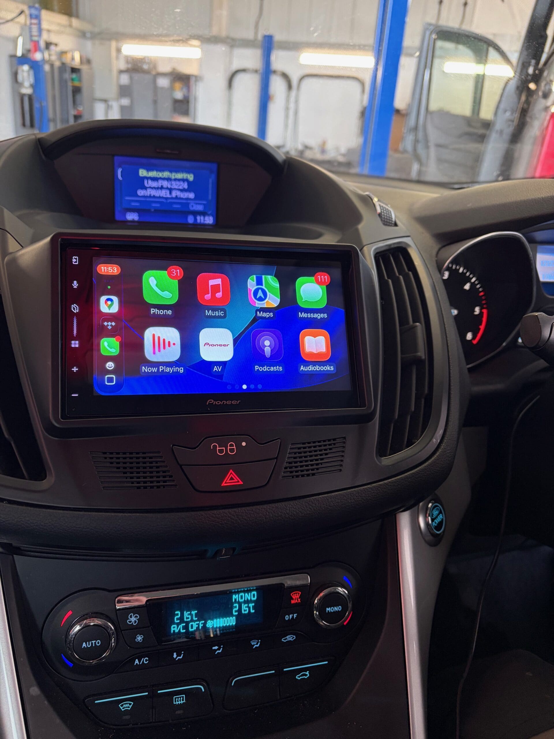 Pioneer double din head unit installed in a Ford C-Max showing a clean, integrated finish