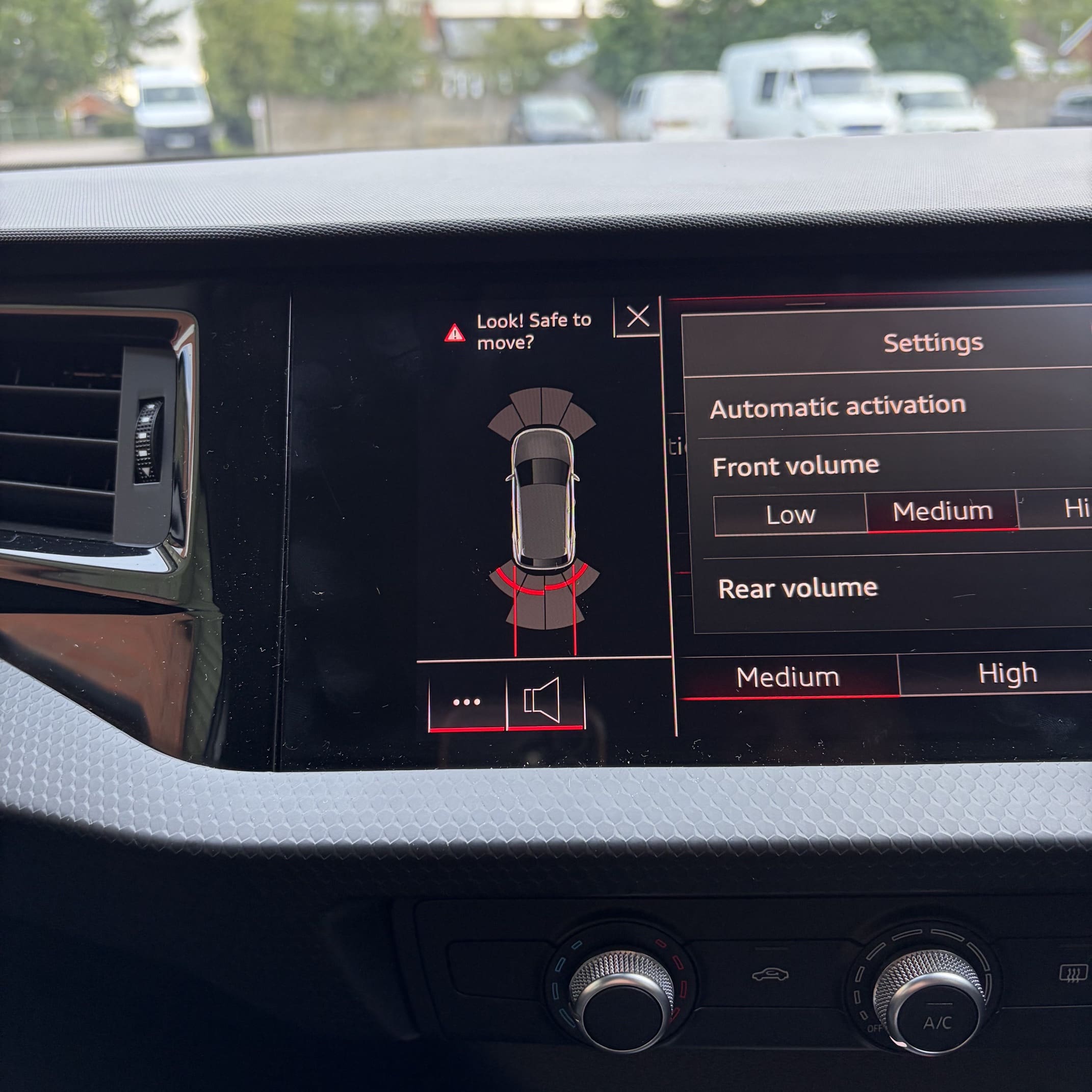 Front and rear parking sensor retrofit completed on an Audi A1 with OEM-style integration
