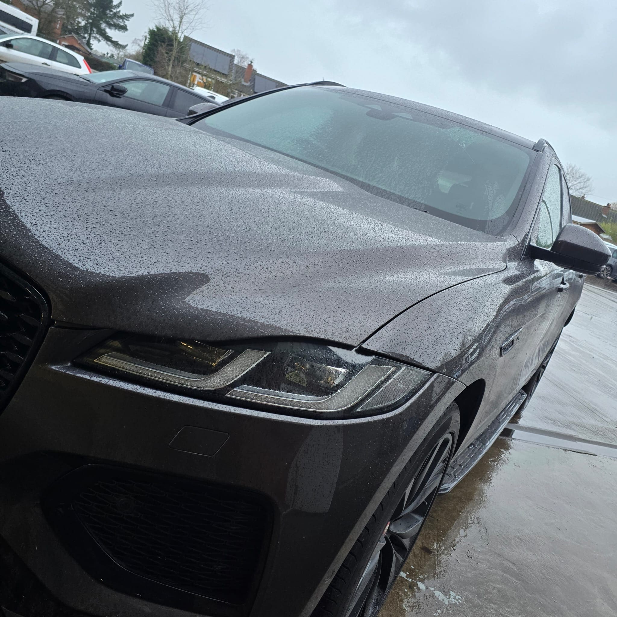 Jaguar F-Pace roof rails retrofit with OEM factory rails installed and roof lining removed for correct mounting