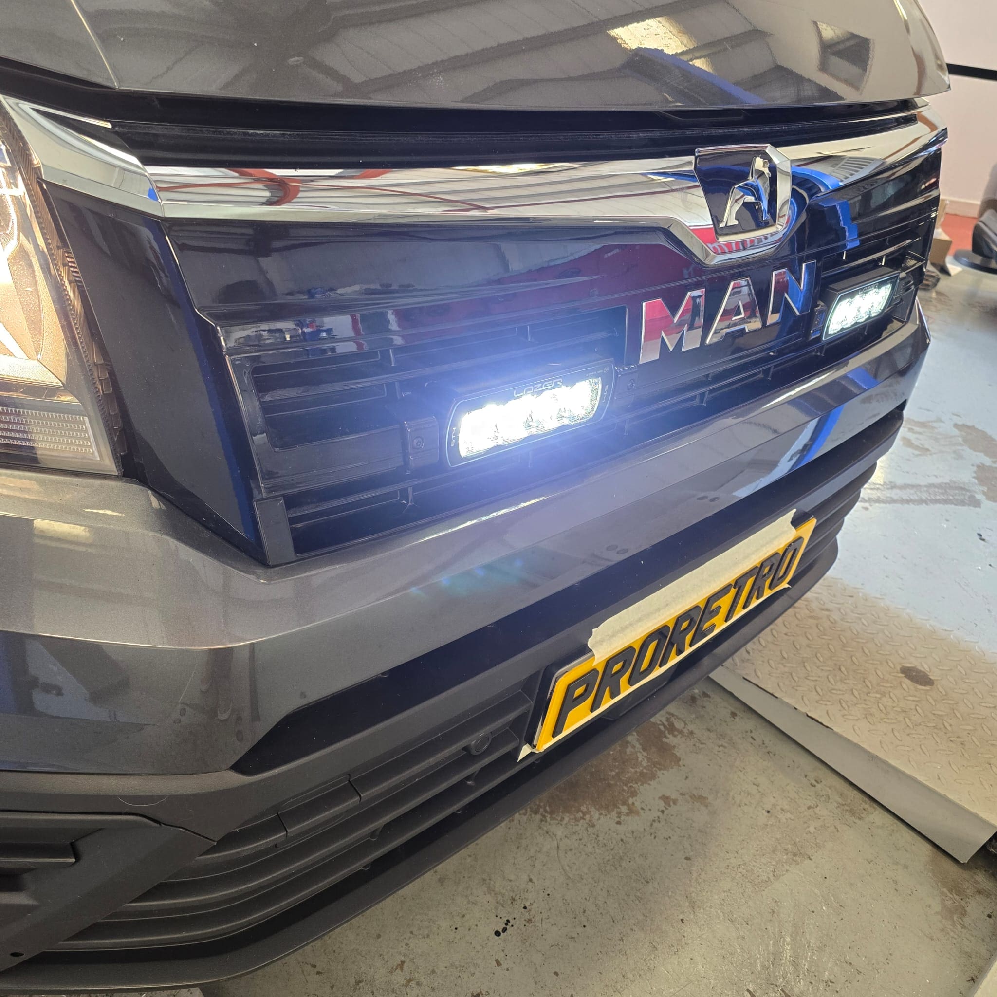 Close-up of LAZER twin LED grille retrofit showing tidy, safe wiring routing