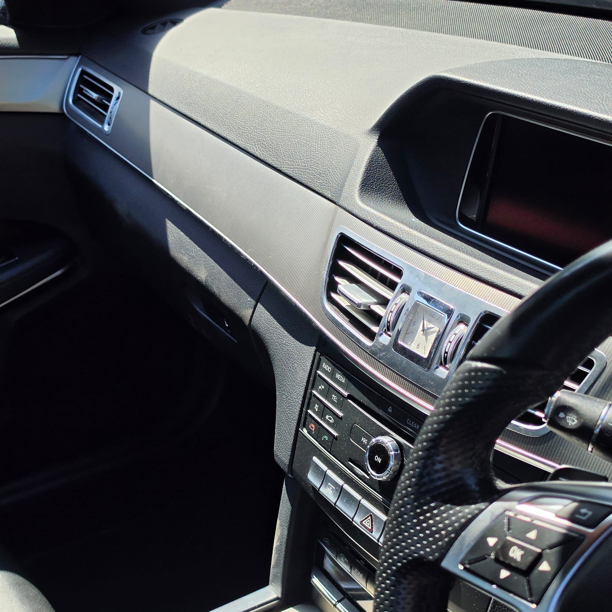 Mercedes E-Class door trim installation during interior upgrade work