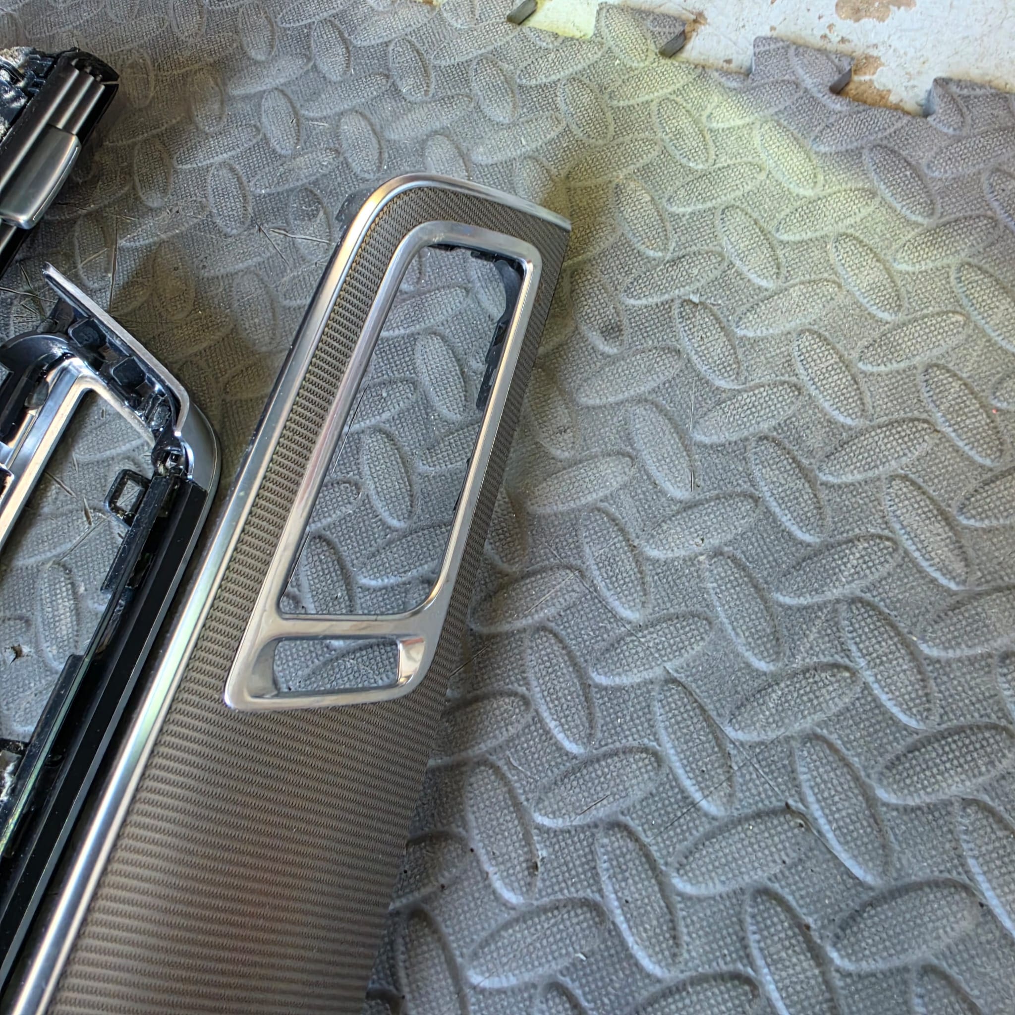 Mercedes E-Class trim mounting frame prepared and plastic welded onto replacement part