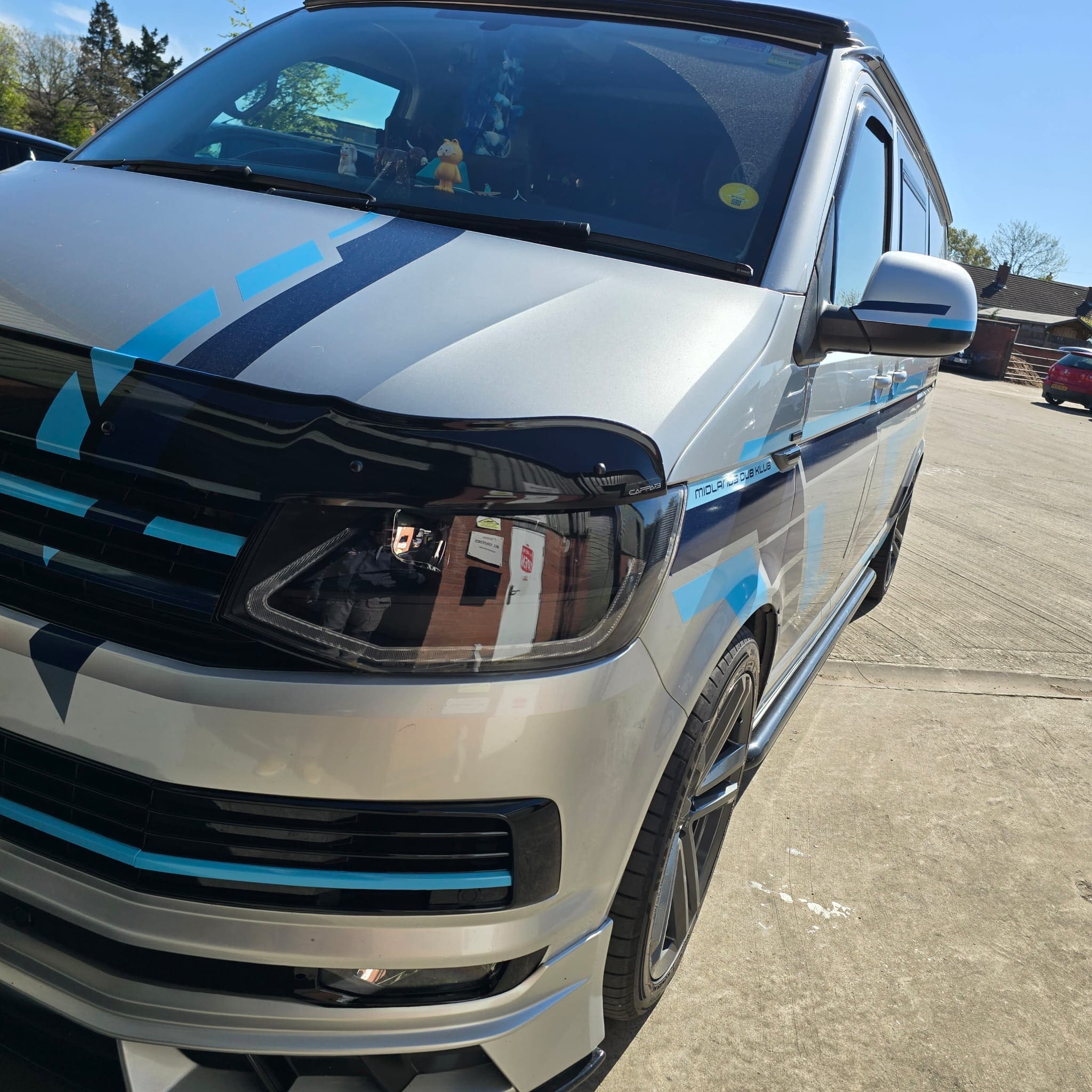 Blue wrapped steering wheel supplied by the customer fitted to match the van’s blue graphics