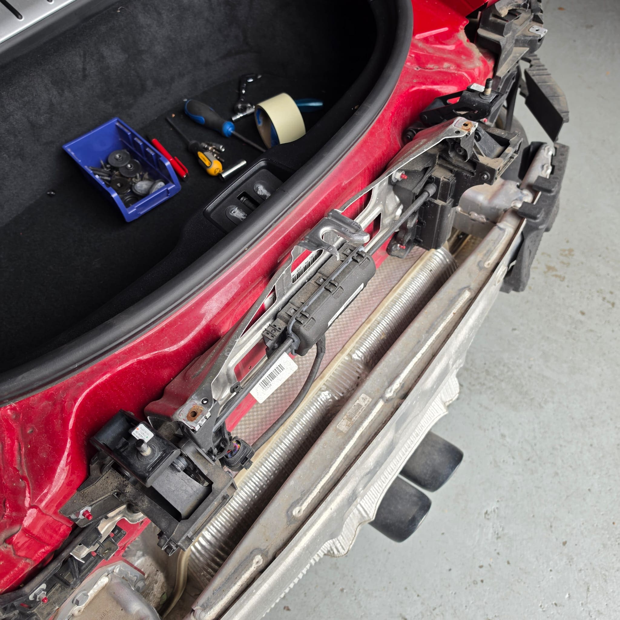 Rear-view camera retrofit completed on Porsche 718 Cayman with OEM screen integration