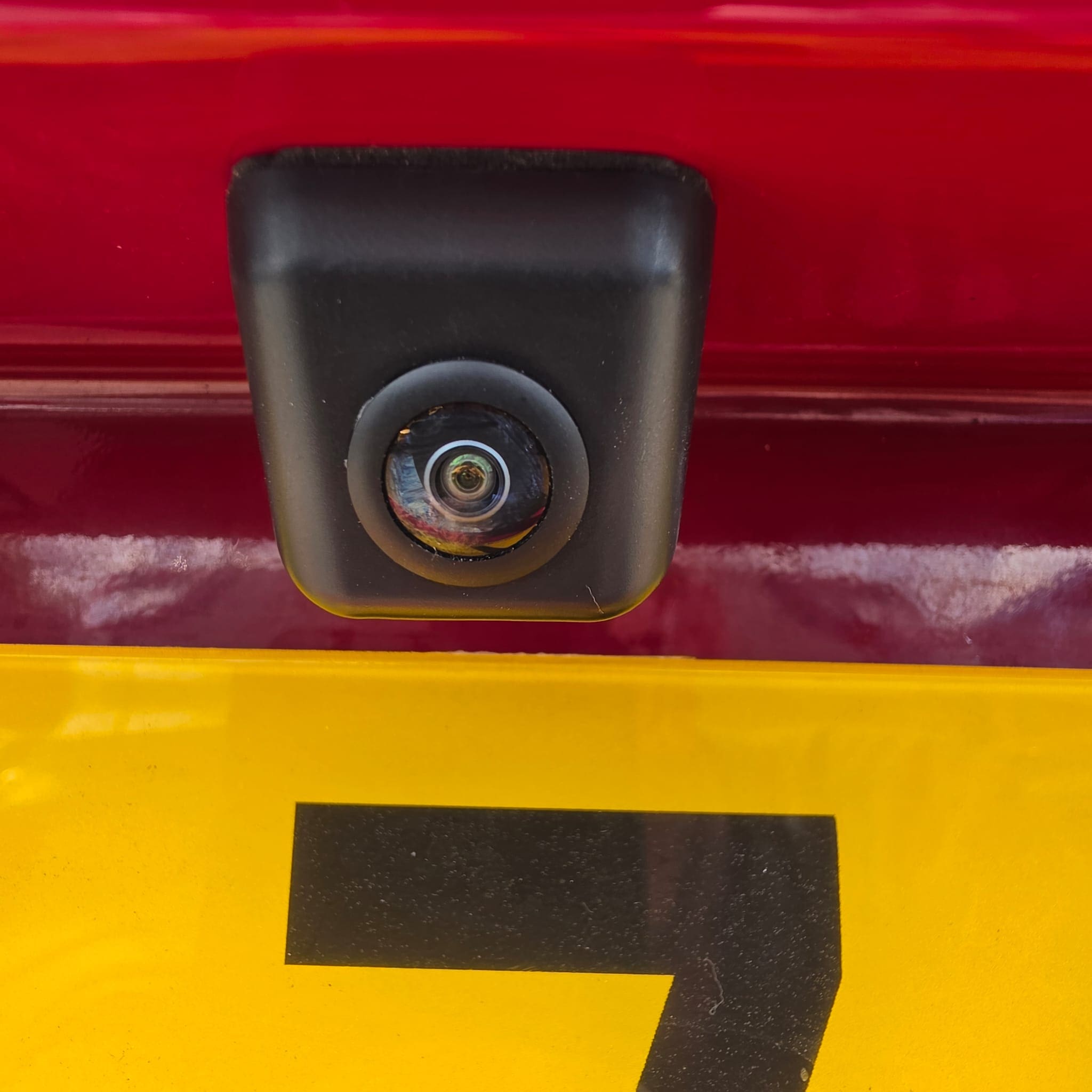 Porsche 718 Cayman stripped for rear view camera installation access