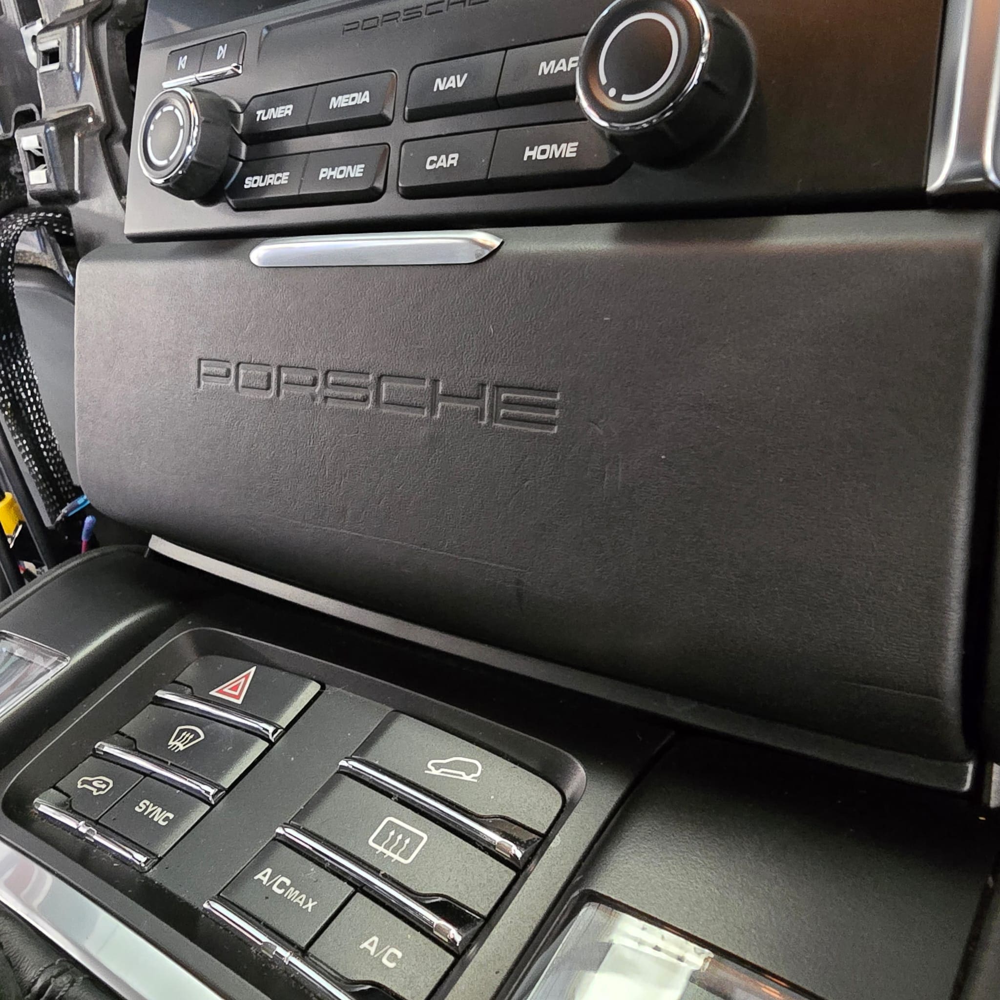 Wireless Apple CarPlay connected on a Porsche Macan using the original infotainment controls