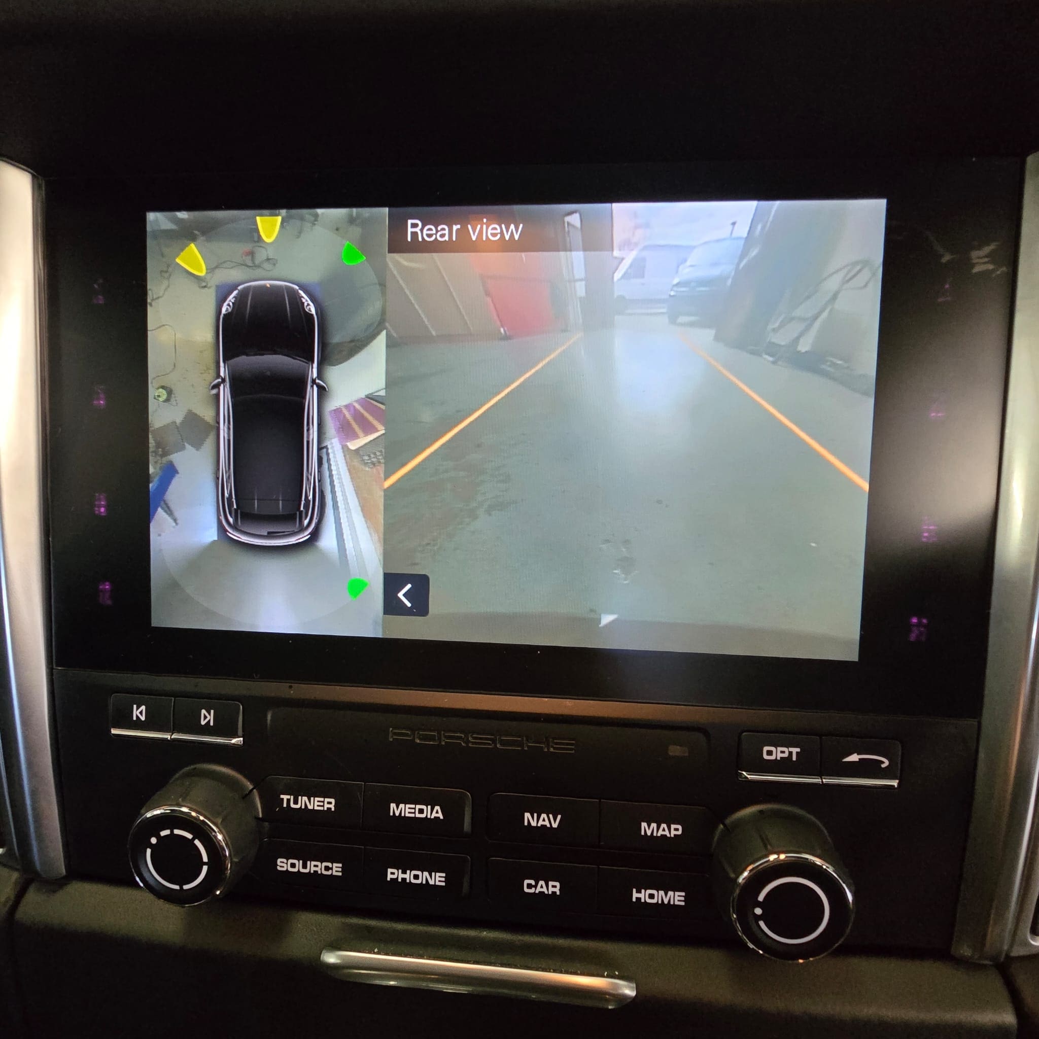 Apple CarPlay interface displayed on the Porsche Macan factory infotainment screen