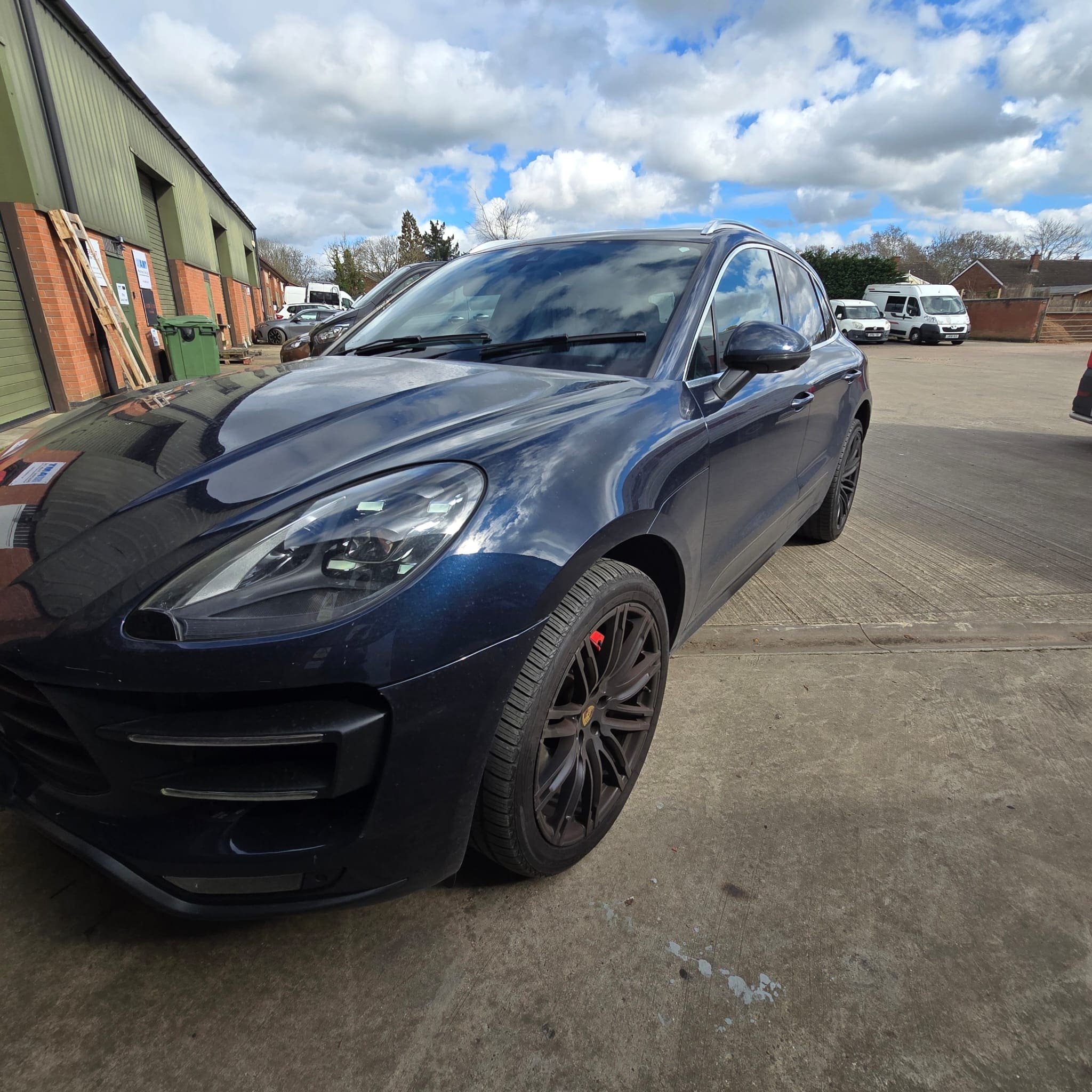 Factory-style CarPlay integration in a Porsche Macan with no visible aftermarket hardware