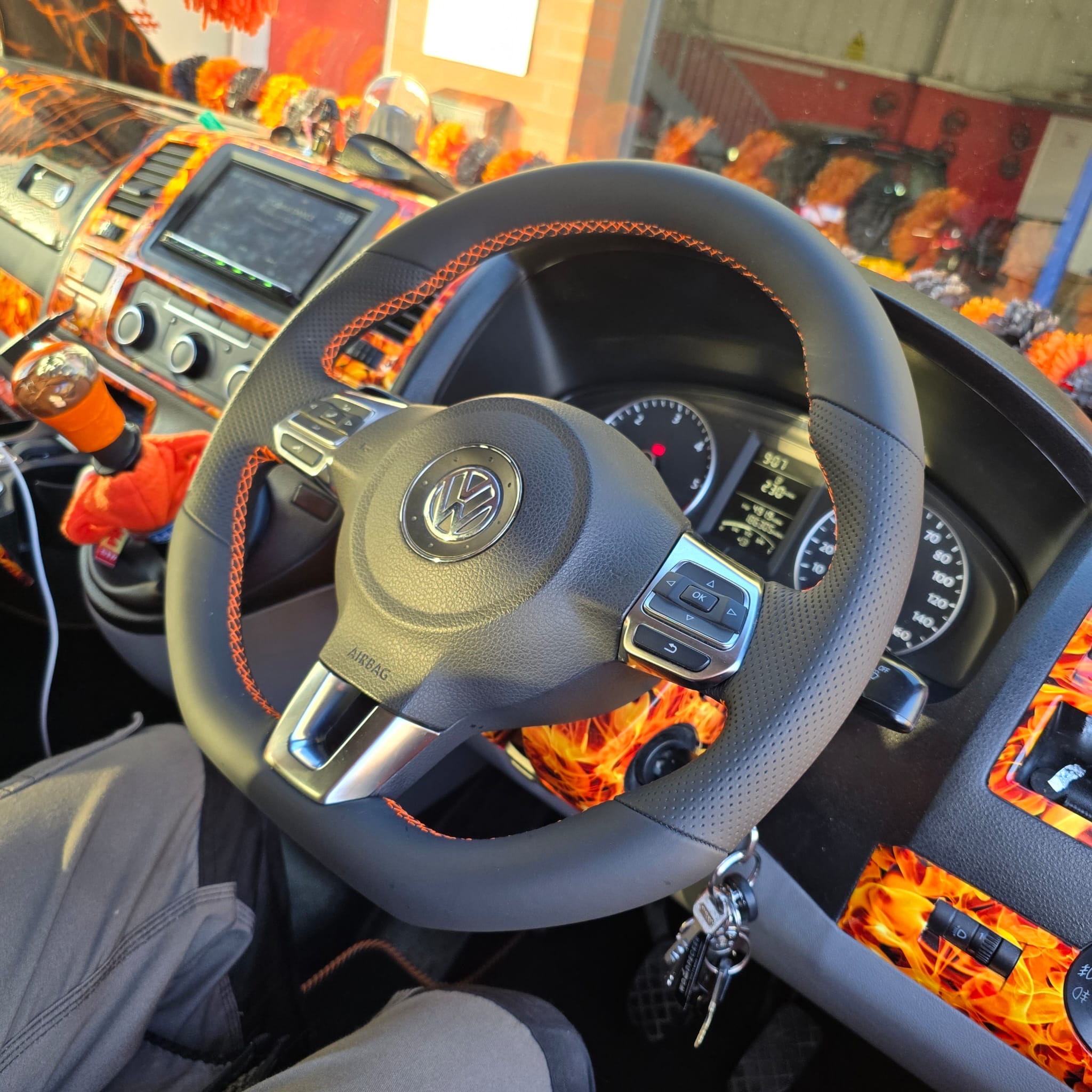 Flat bottom MK6 Golf steering wheel with orange leather stitch
