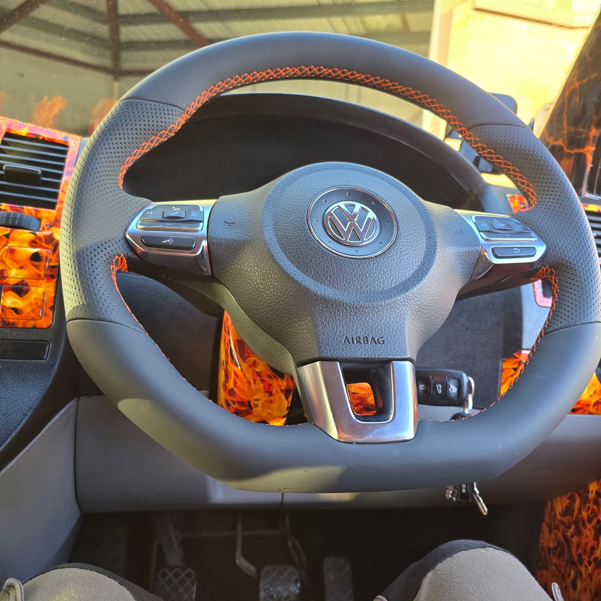 Orange stitched MK6 Golf steering wheel retrimmed in Nappa