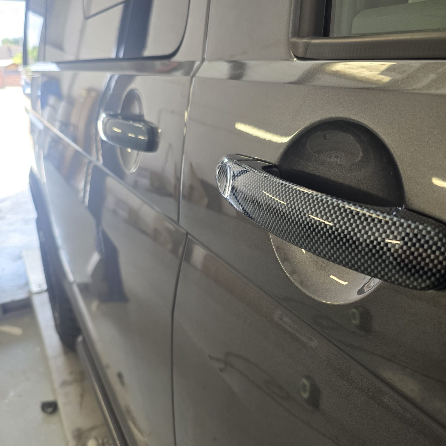 VW T6.1 front end carbon badge closeup