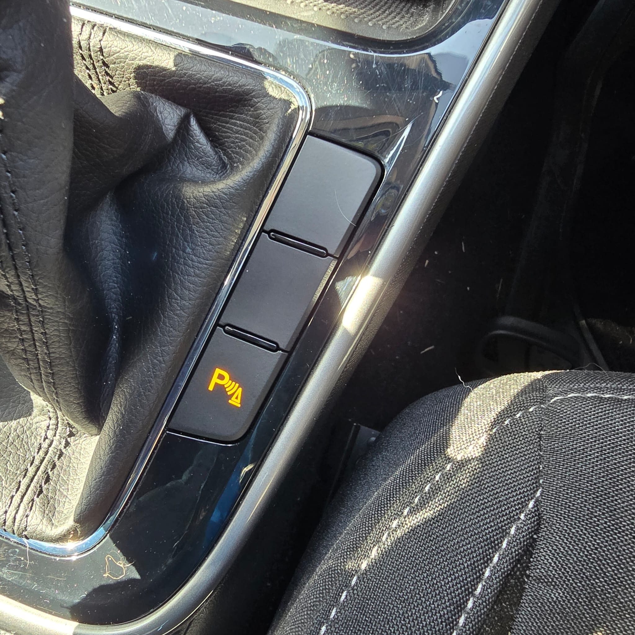 Workshop view of Skoda Fabia 2025 during diagnostics and coding for front parking sensors