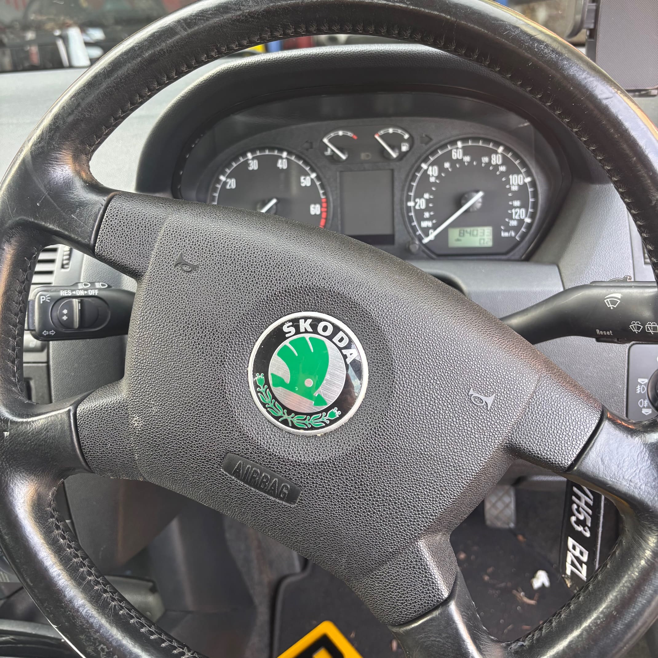 Cruise control retrofit wiring and setup on a Skoda Fabia during an OEM-style installation