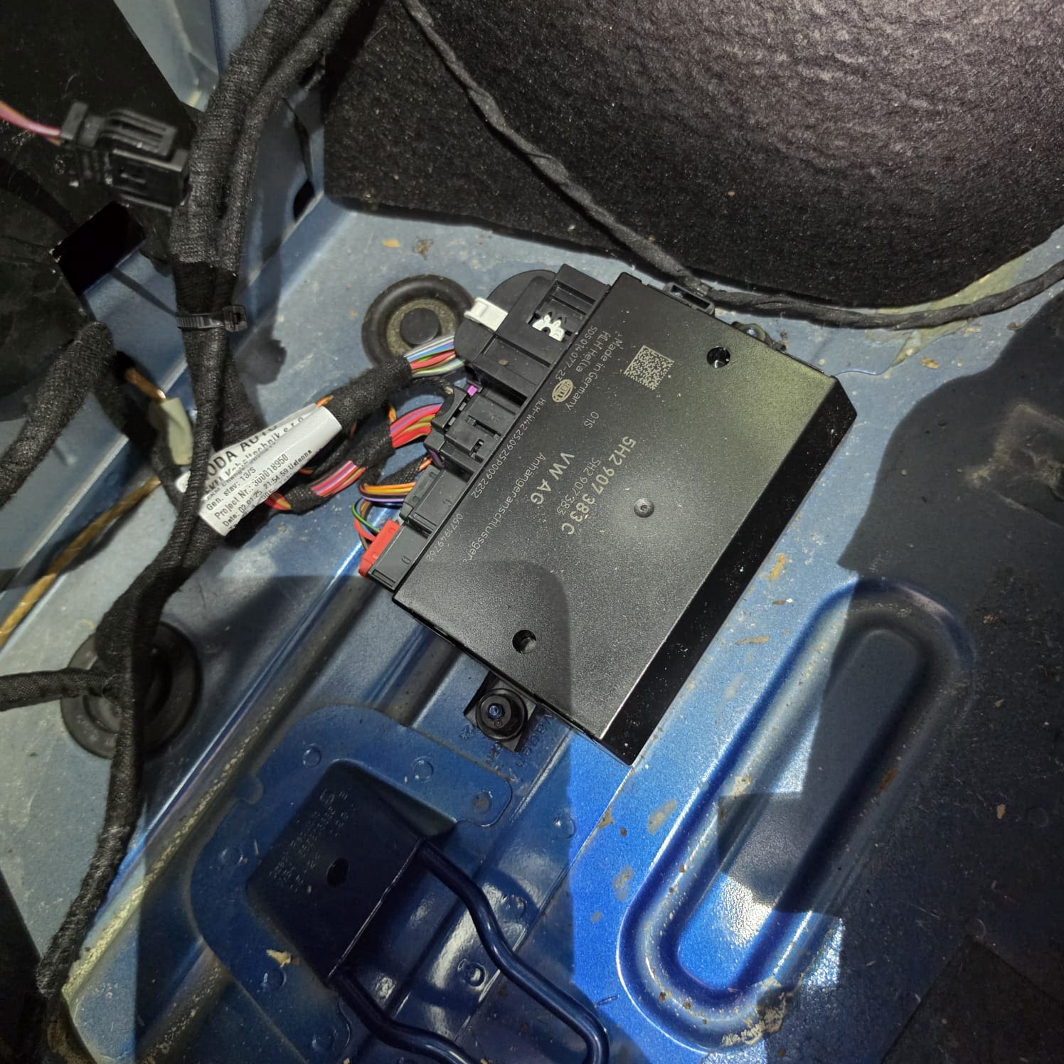 Boot area release button for the retractable towbar on a Skoda Kodiaq