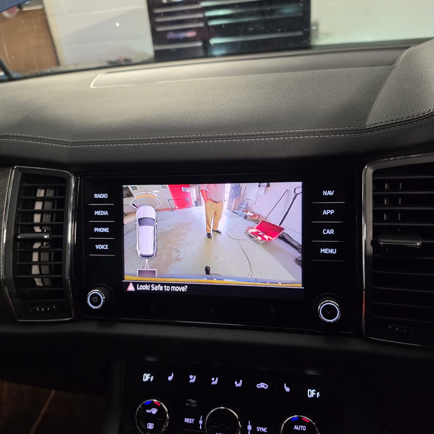 Skoda Kodiaq towbar retrofit showing integrated retractable towbar installation