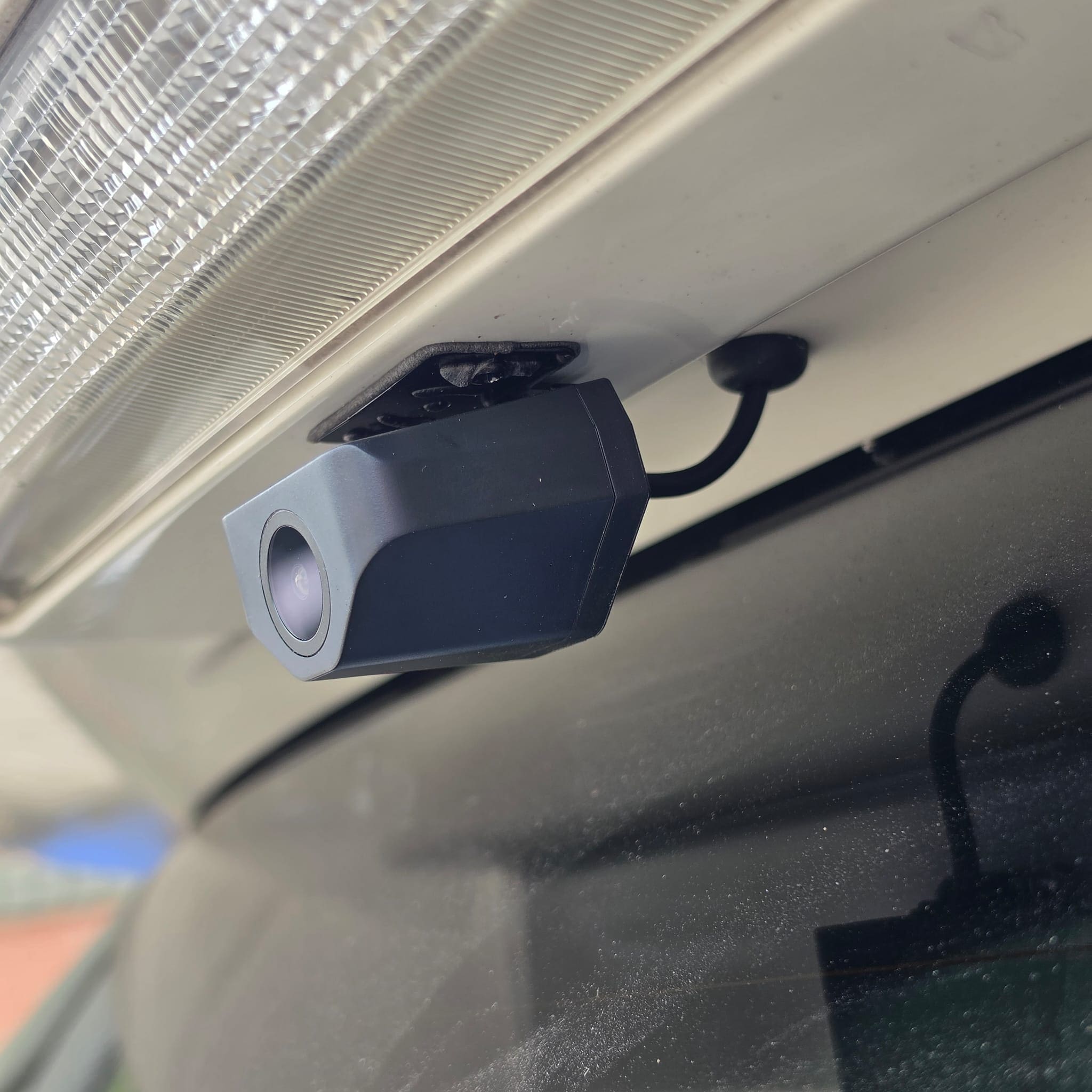 Toyota Estima Wolfbox mirror and reversing camera retrofit completed with tidy finish