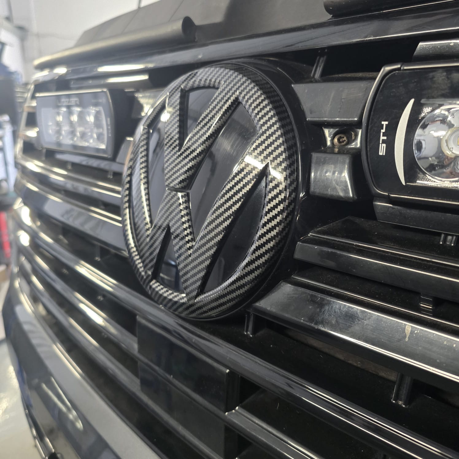 VW Transporter T6.1 carbon fibre effect door handles and badge retrofit