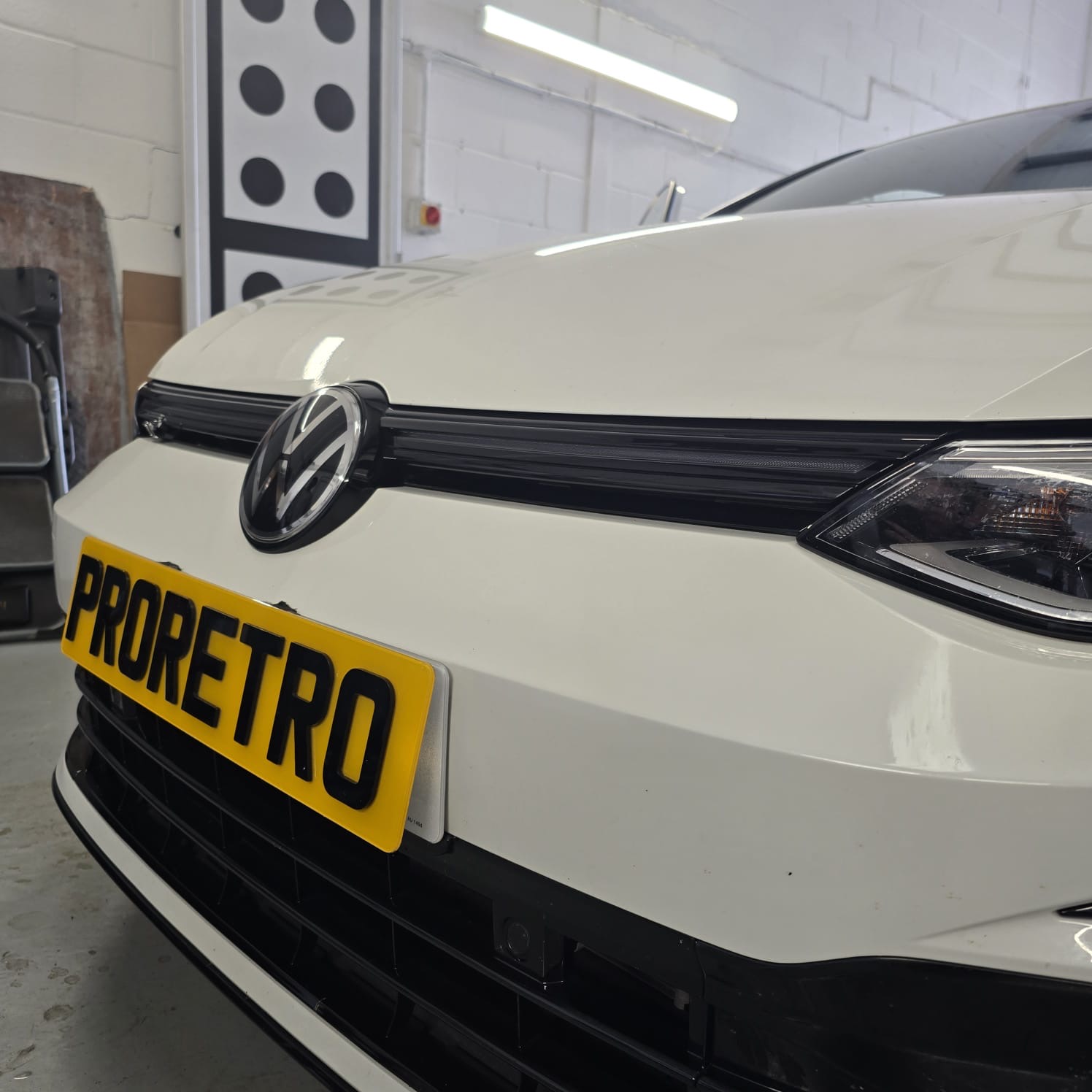 Golf MK8 R-Line with OE front grille and light bar retrofit