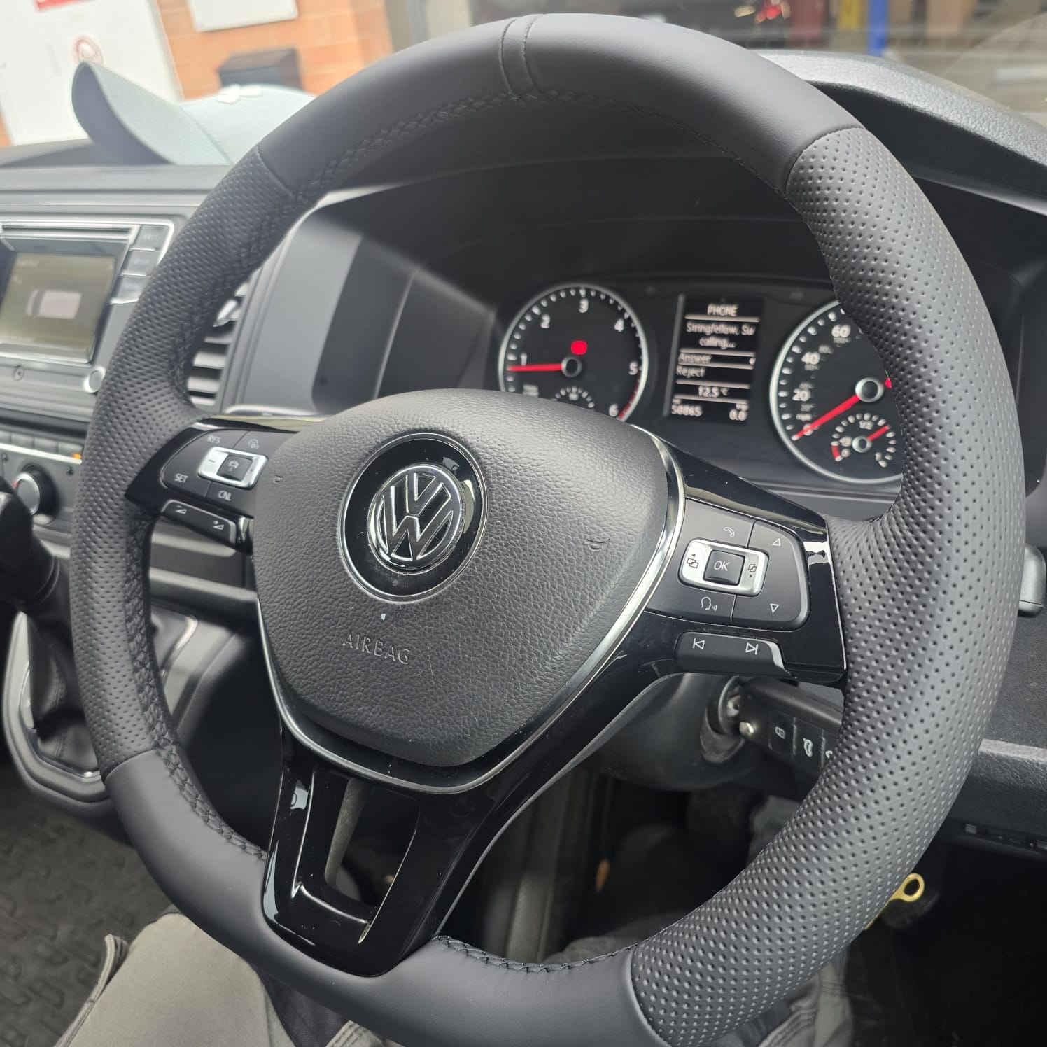 VW T6 retrimmed steering wheel close-up