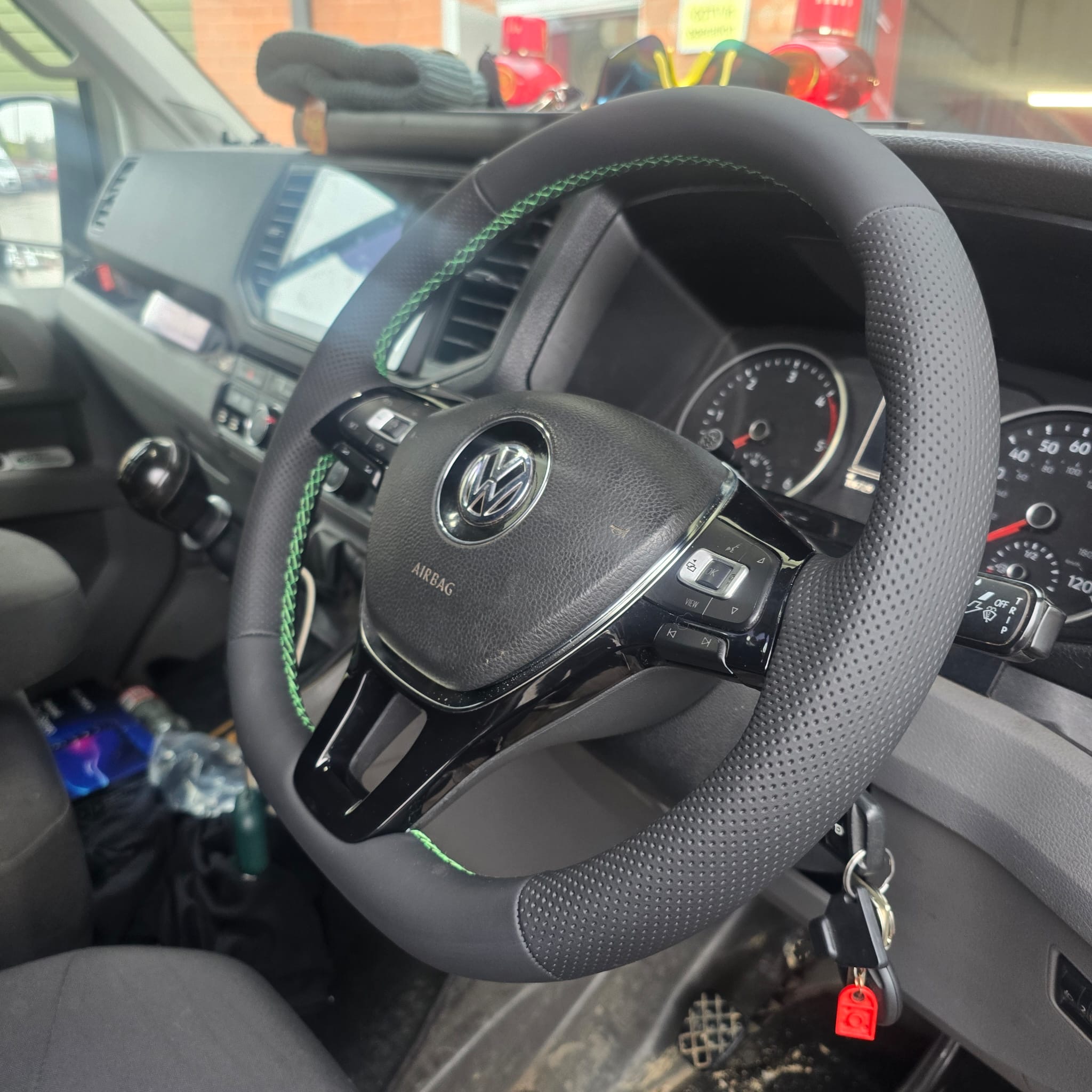VW Crafter flat-bottom steering wheel with green stitching