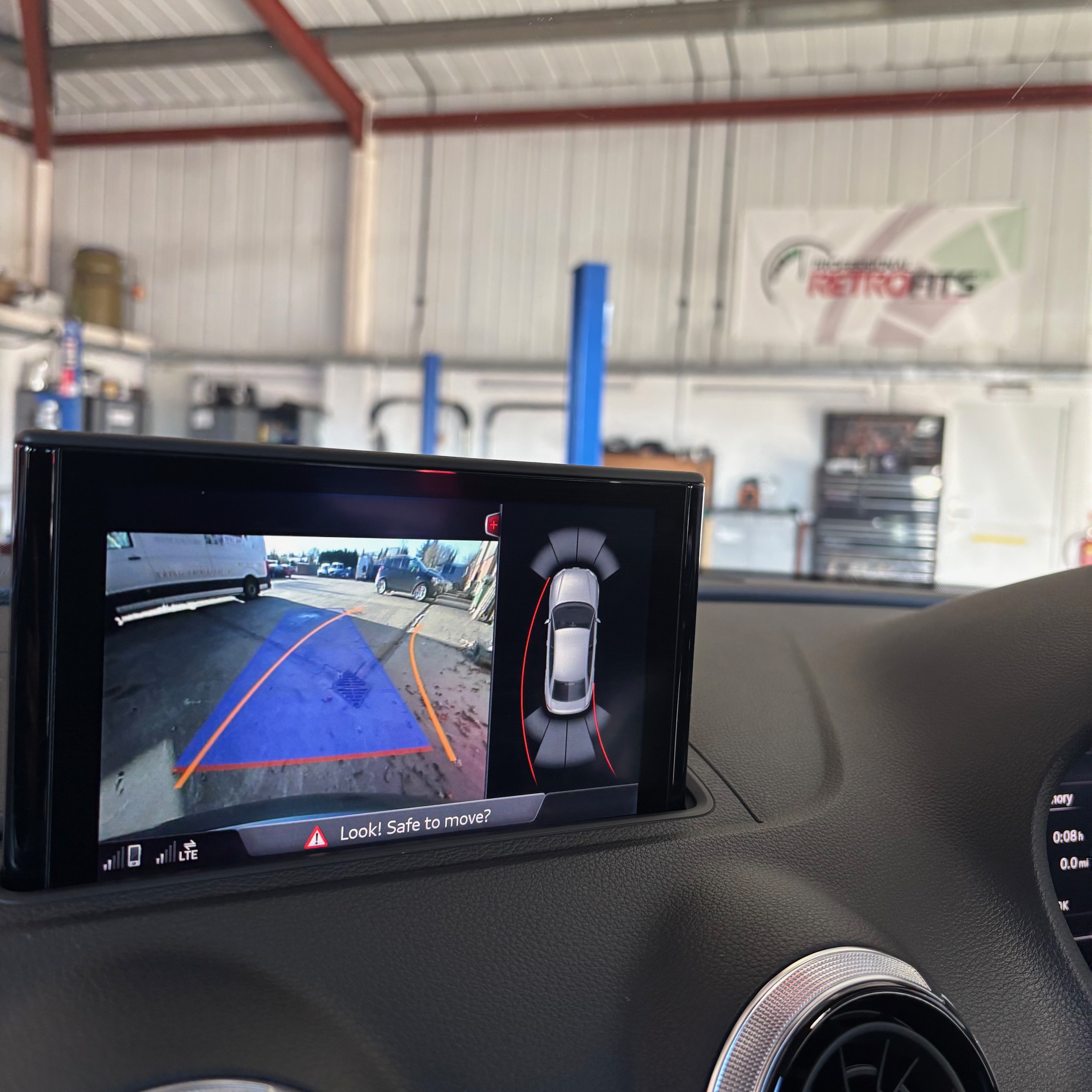 Audi MMI screen with OEM camera view