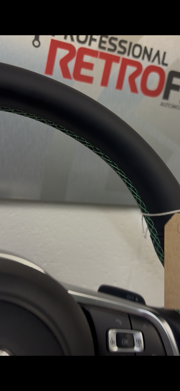 Golf MK7 BadBoy steering wheel with UK-made retrim, green stitching, and DSG retrofit compatibility