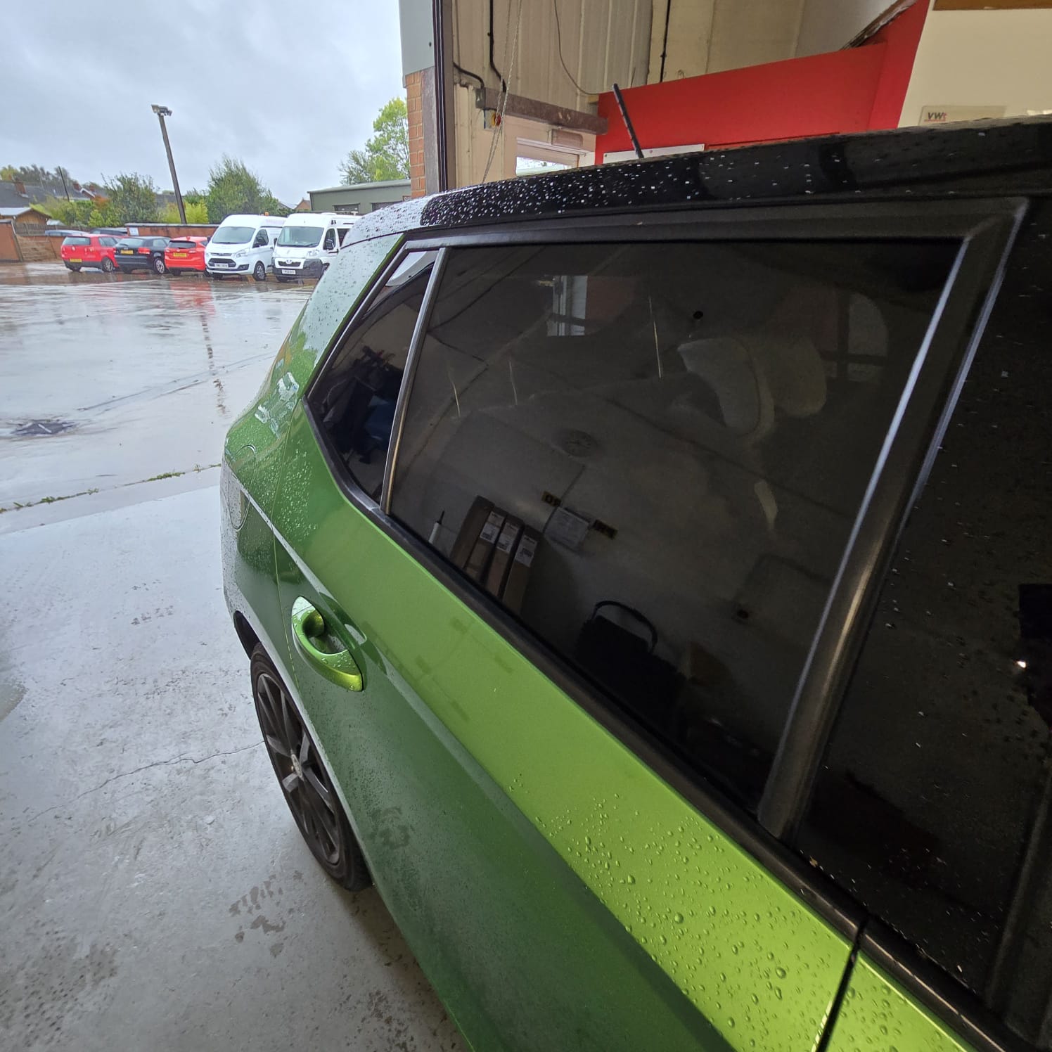 Rear window tint on green Škoda Fabia