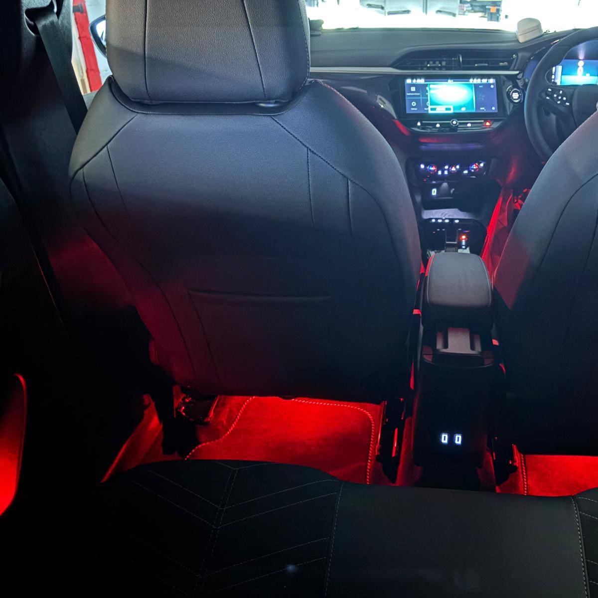 Dimmer switch control for red ambient lighting installed within driver reach in a Vauxhall Astra