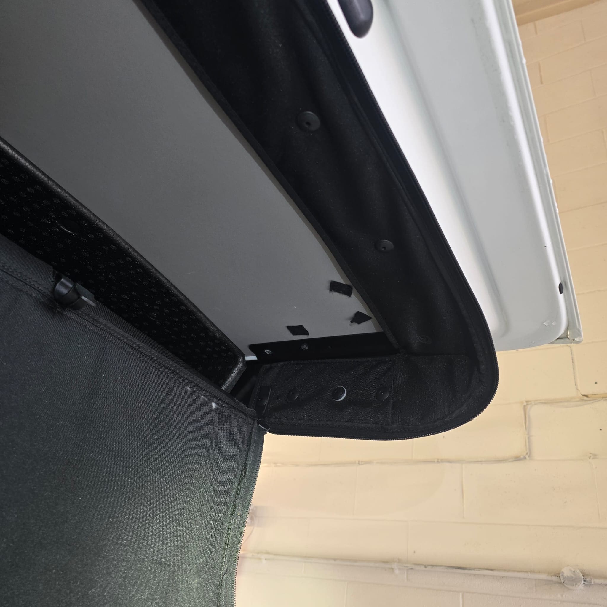 Volkswagen California tailgate trim refitted after correcting previous install mess during camera retrofit