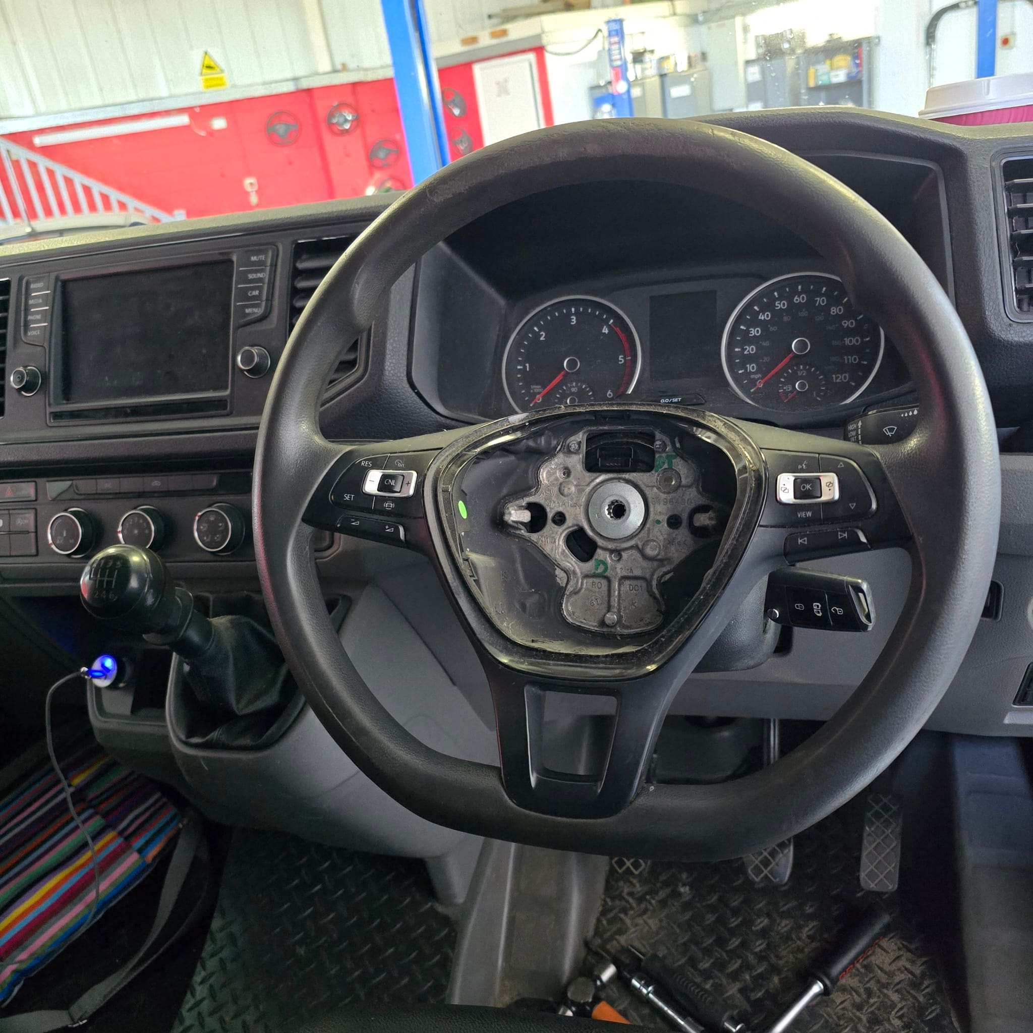 Detail shot of stitching and leather texture on the retrimmed Volkswagen Crafter steering wheel