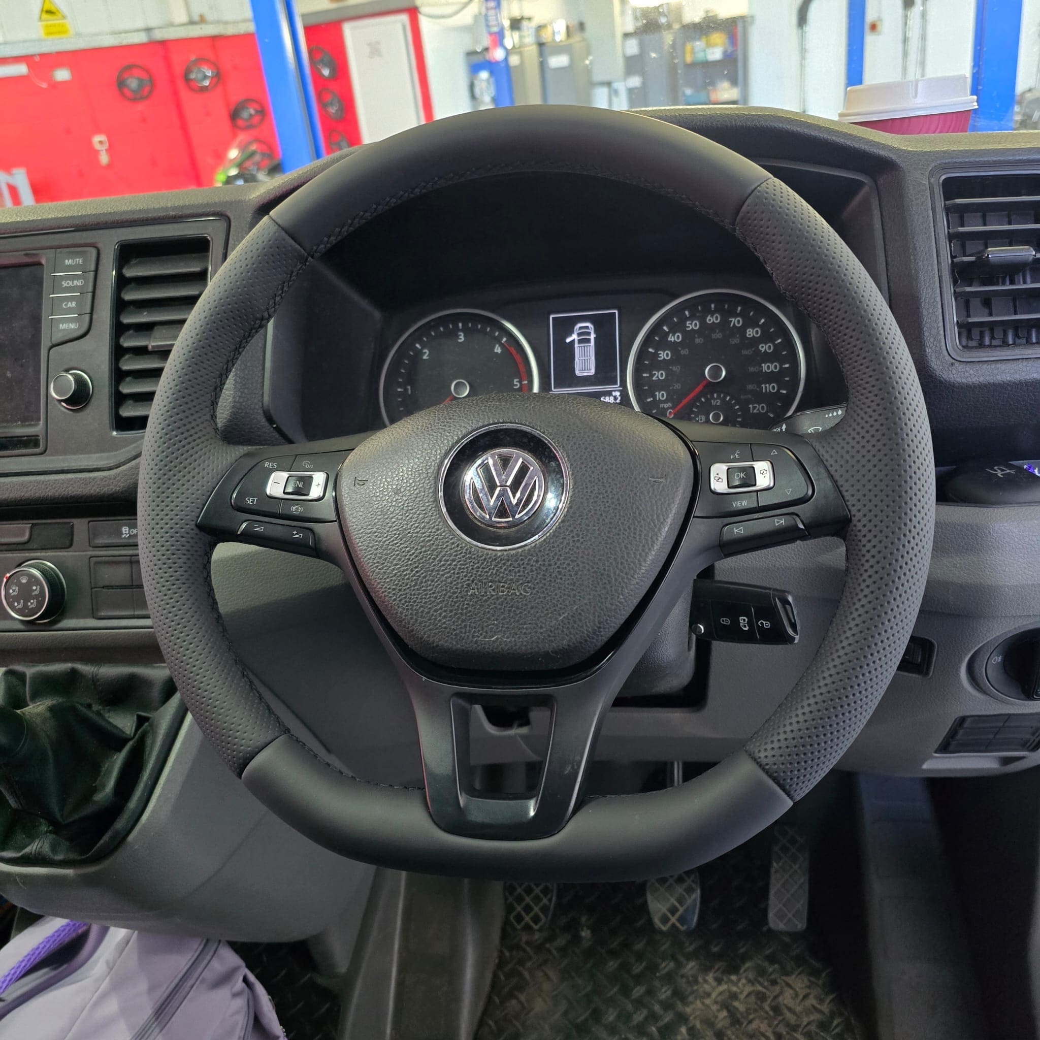 Volkswagen Crafter interior showing the newly fitted flat-bottom steering wheel retrim