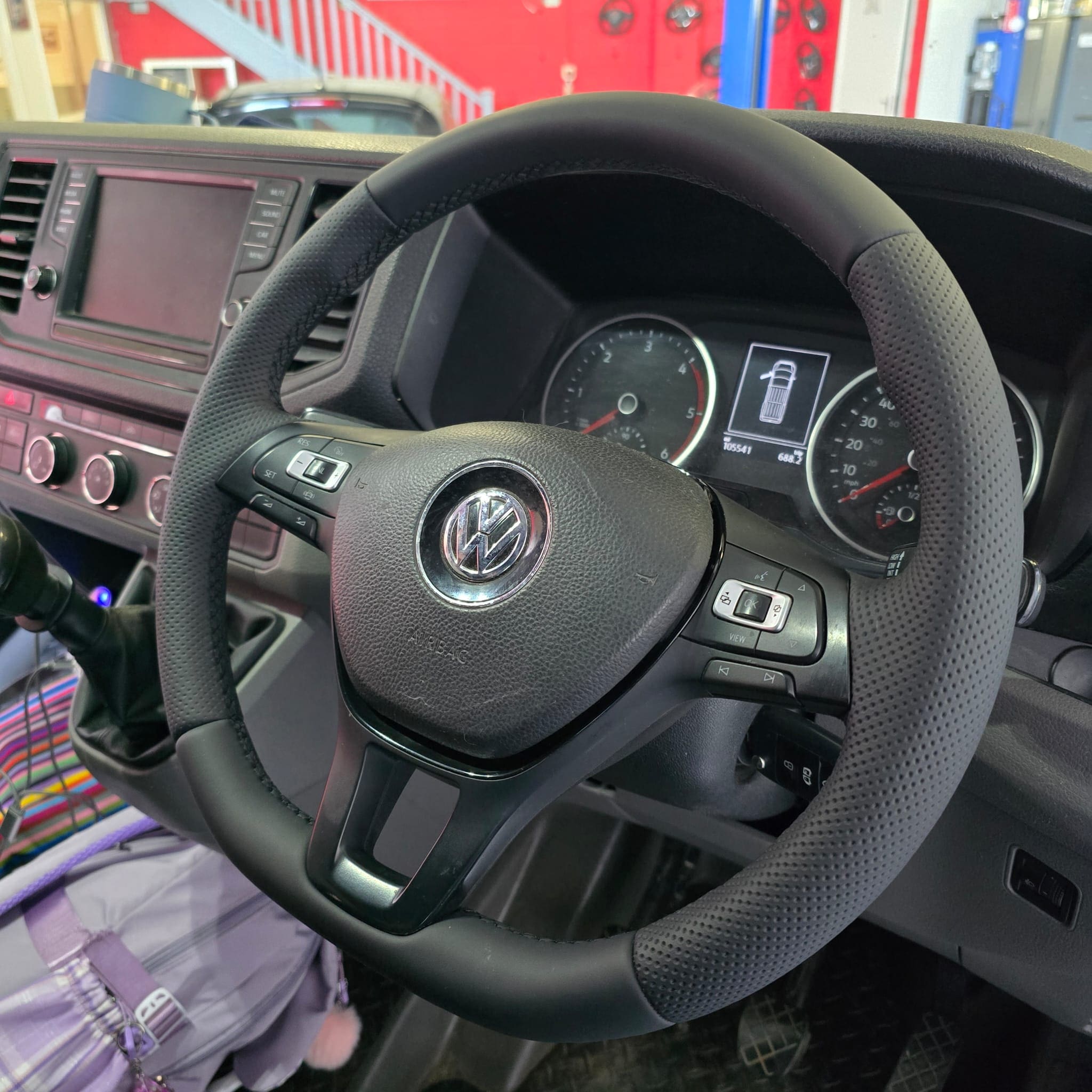 Finished view of the installed custom retrimmed steering wheel in the Volkswagen Crafter cabin