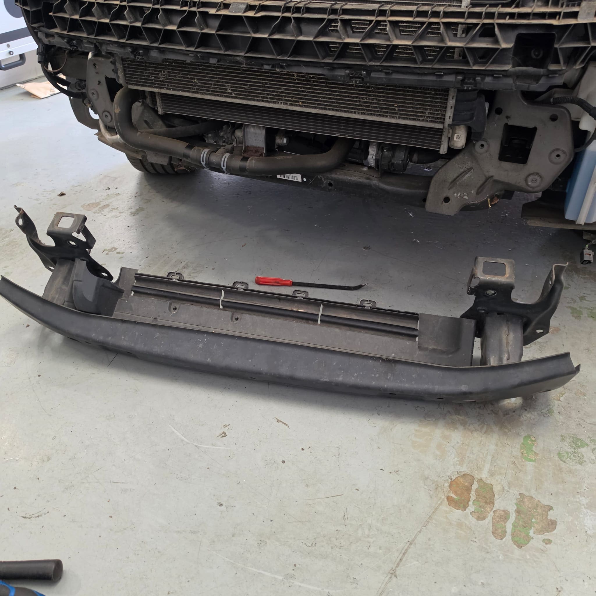 OEM-style wiring and front radar installation on Volkswagen T6 California
