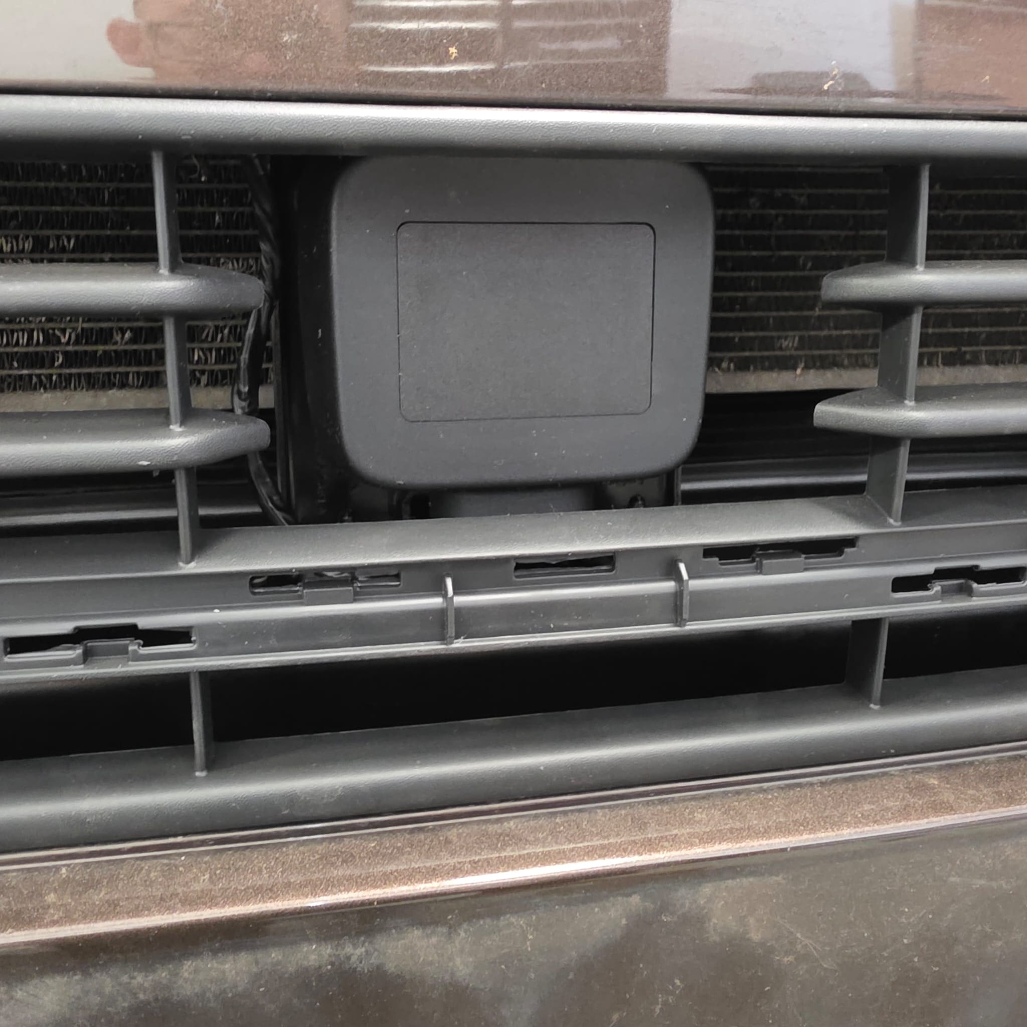 Volkswagen T6 California cruise control retrofit showing radar support parts and wiring route