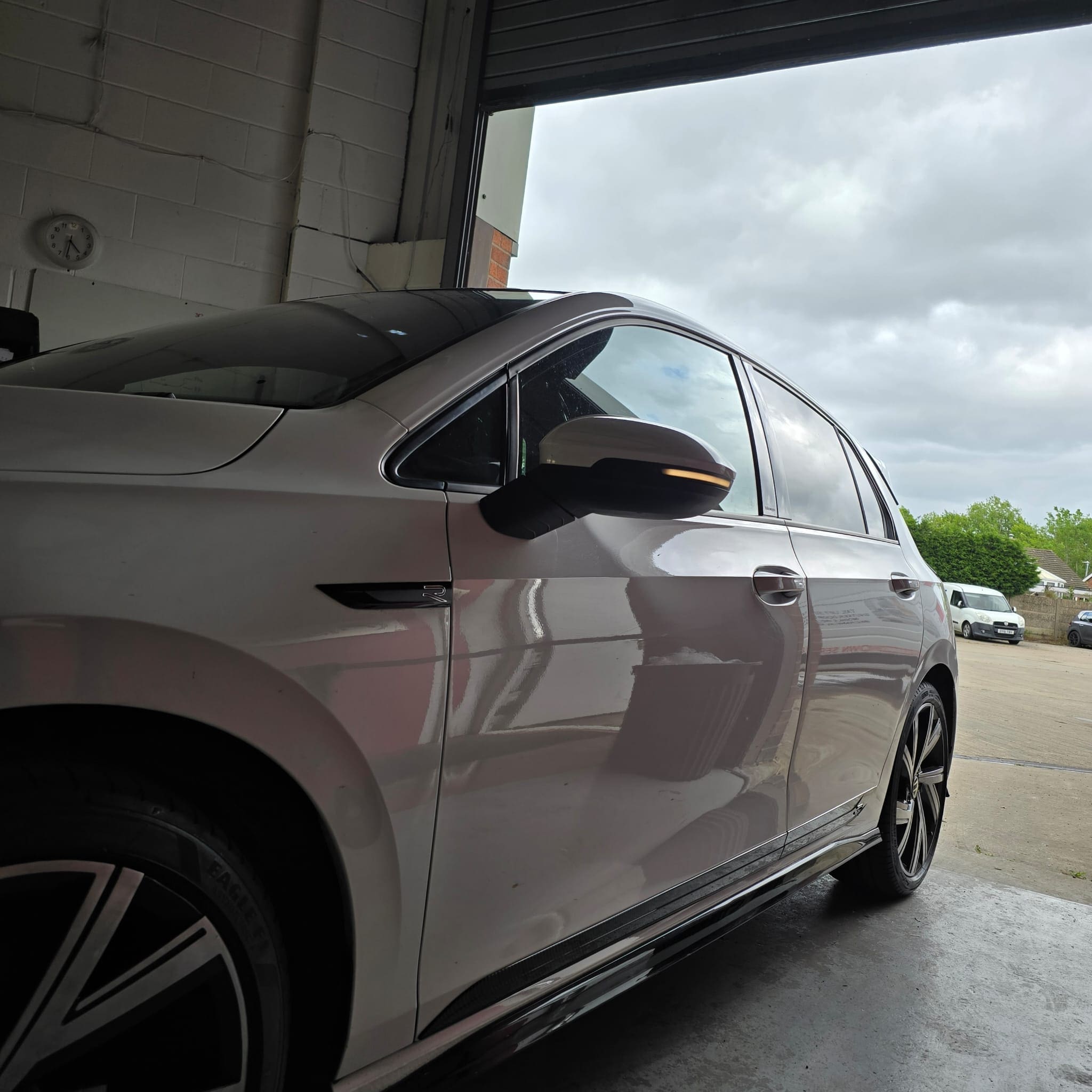 Side view of VW Golf Mk8 showing upgraded mirror indicators to match sporty styling