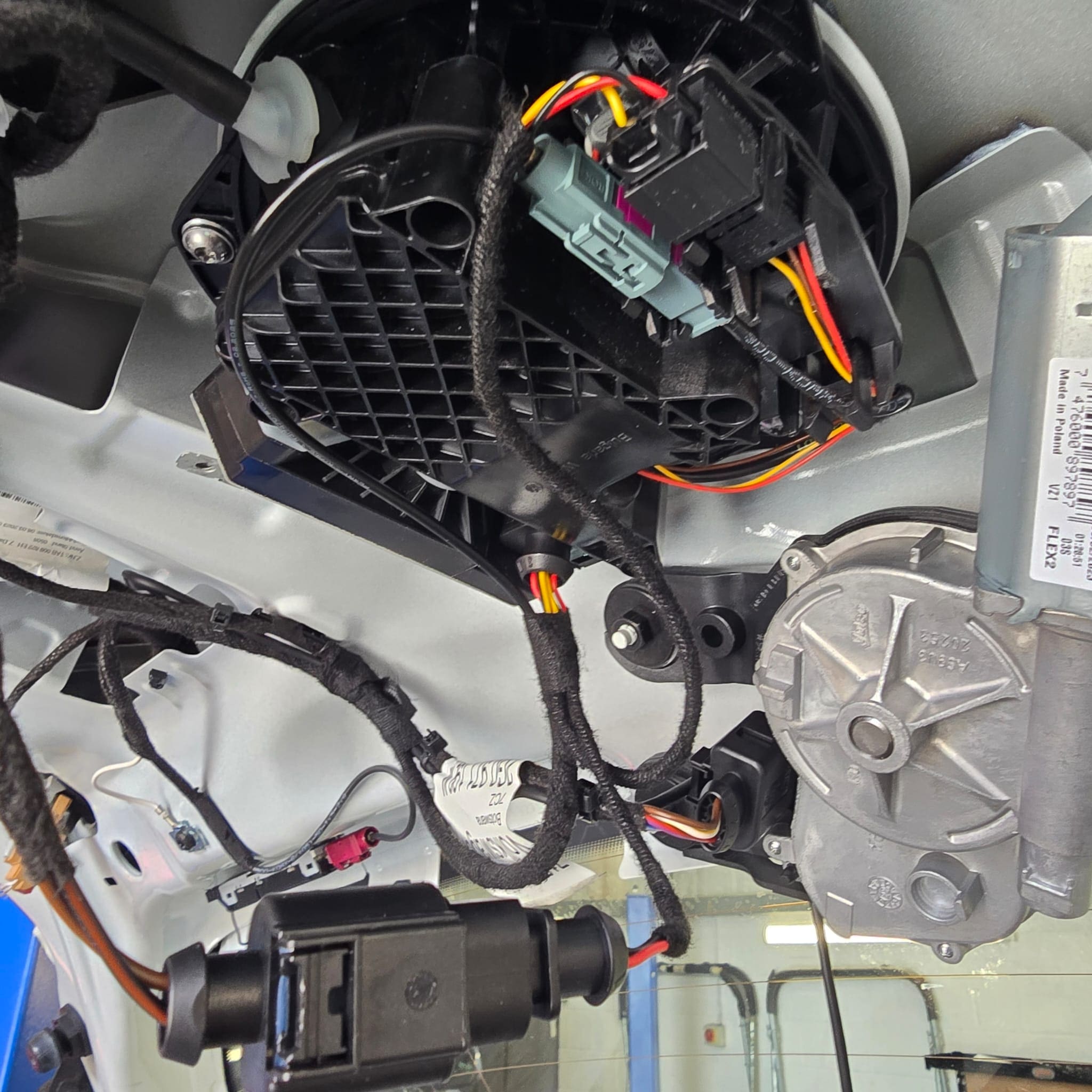 Front dash camera installed neatly behind the windshield in a VW Polo