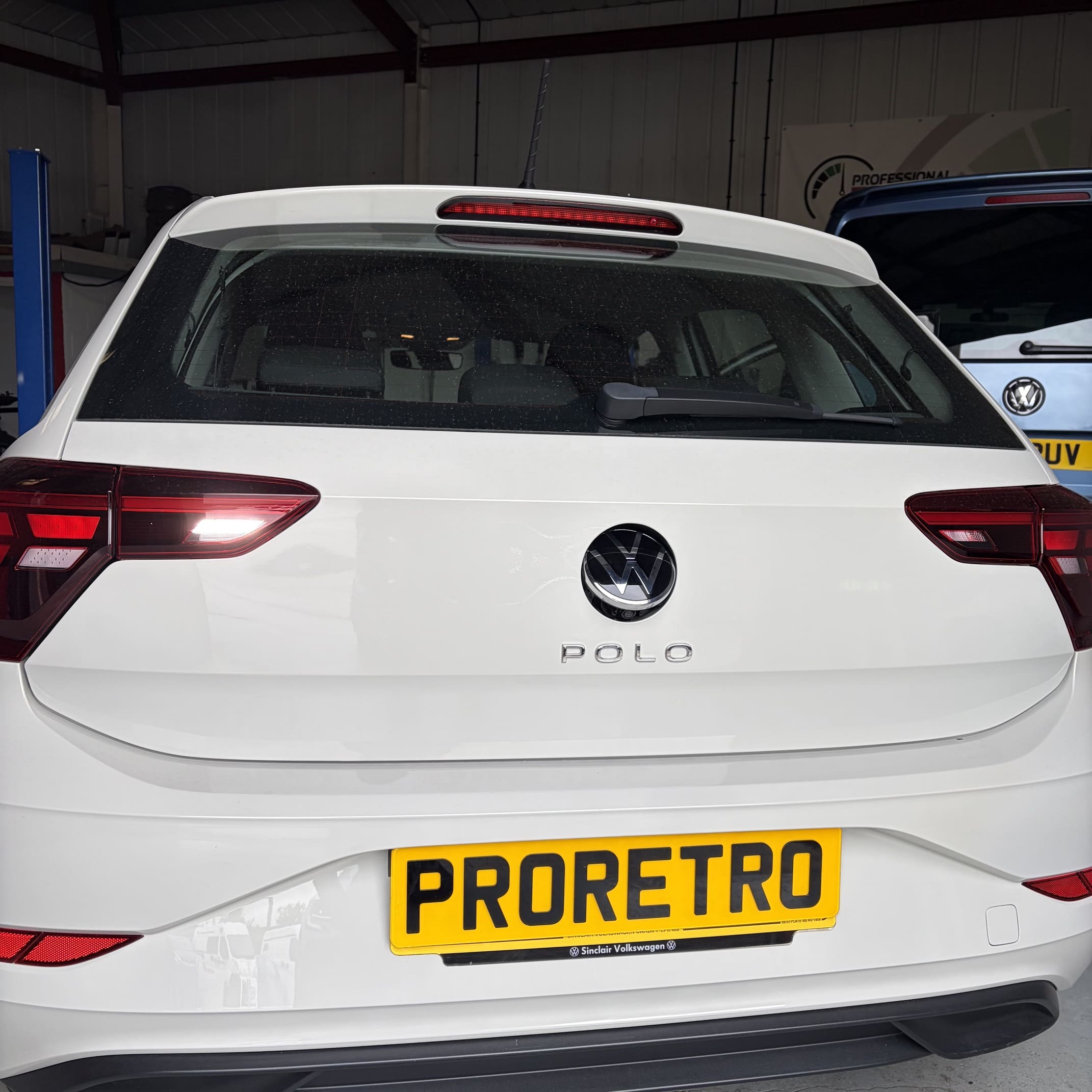 VW Polo AW fitted with genuine OEM rear view camera in pop-out VW badge