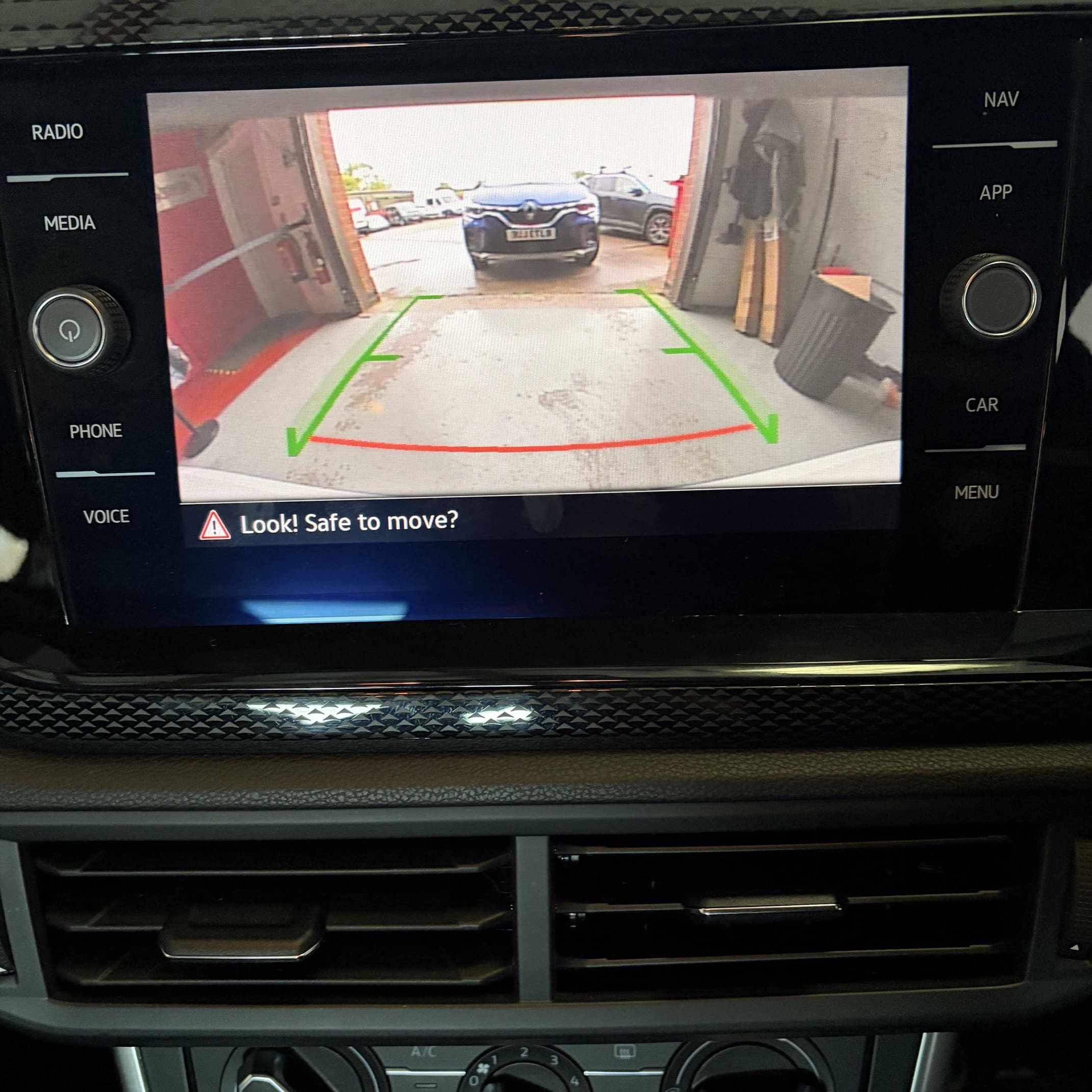 Rear badge camera retrofit on VW Polo AW with factory screen integration