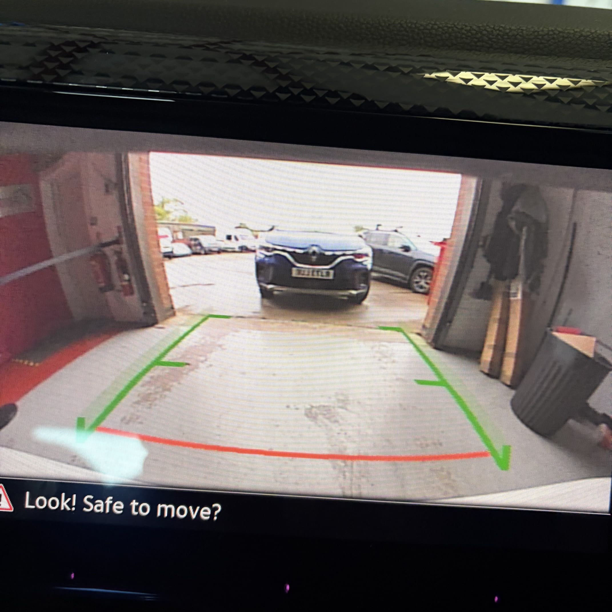 VW Polo AW rear badge camera retrofit completed with OEM functionality